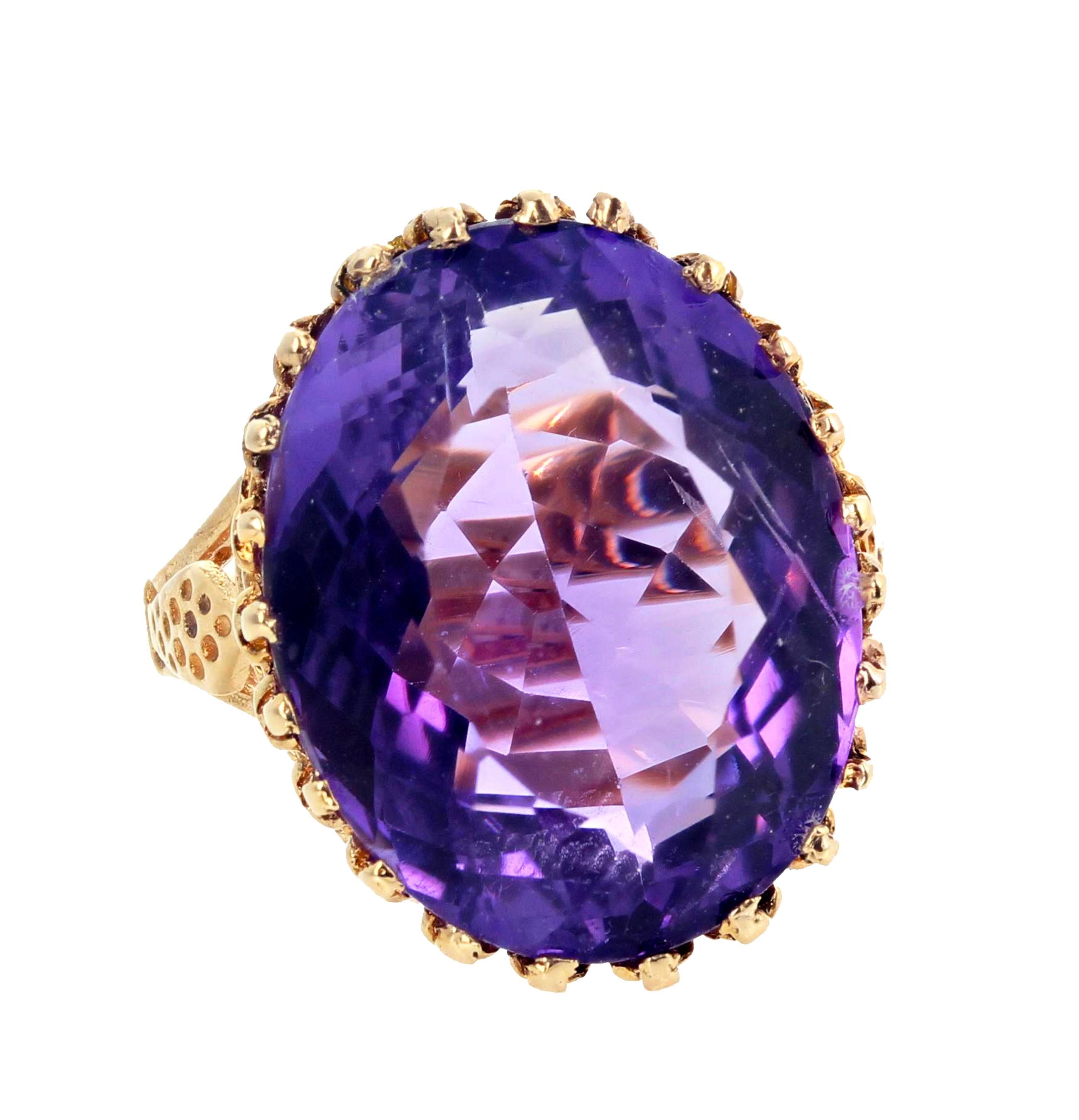 Huge sparkling pinky purply natural Amethyst - 21.78 carats - 20 mm x 17.2 nmm - set in this beautiful 10Kt yellow gold ring size 8 (sizable FOR FREE).  There are no eye visible inclusions in this gorgeous Amethyst.  This gemstone is superbly cut to