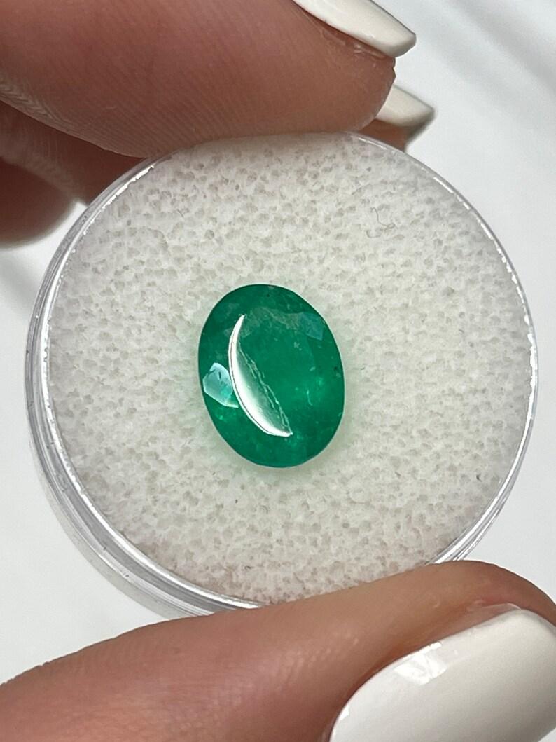 2.18 Carat 10.4x8.1 Rich Muzo Green Colombian Emerald - Oval Cut May Gem In New Condition For Sale In Jupiter, FL