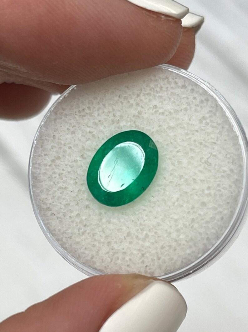 Women's or Men's 2.18 Carat 10.4x8.1 Rich Muzo Green Colombian Emerald - Oval Cut May Gem For Sale
