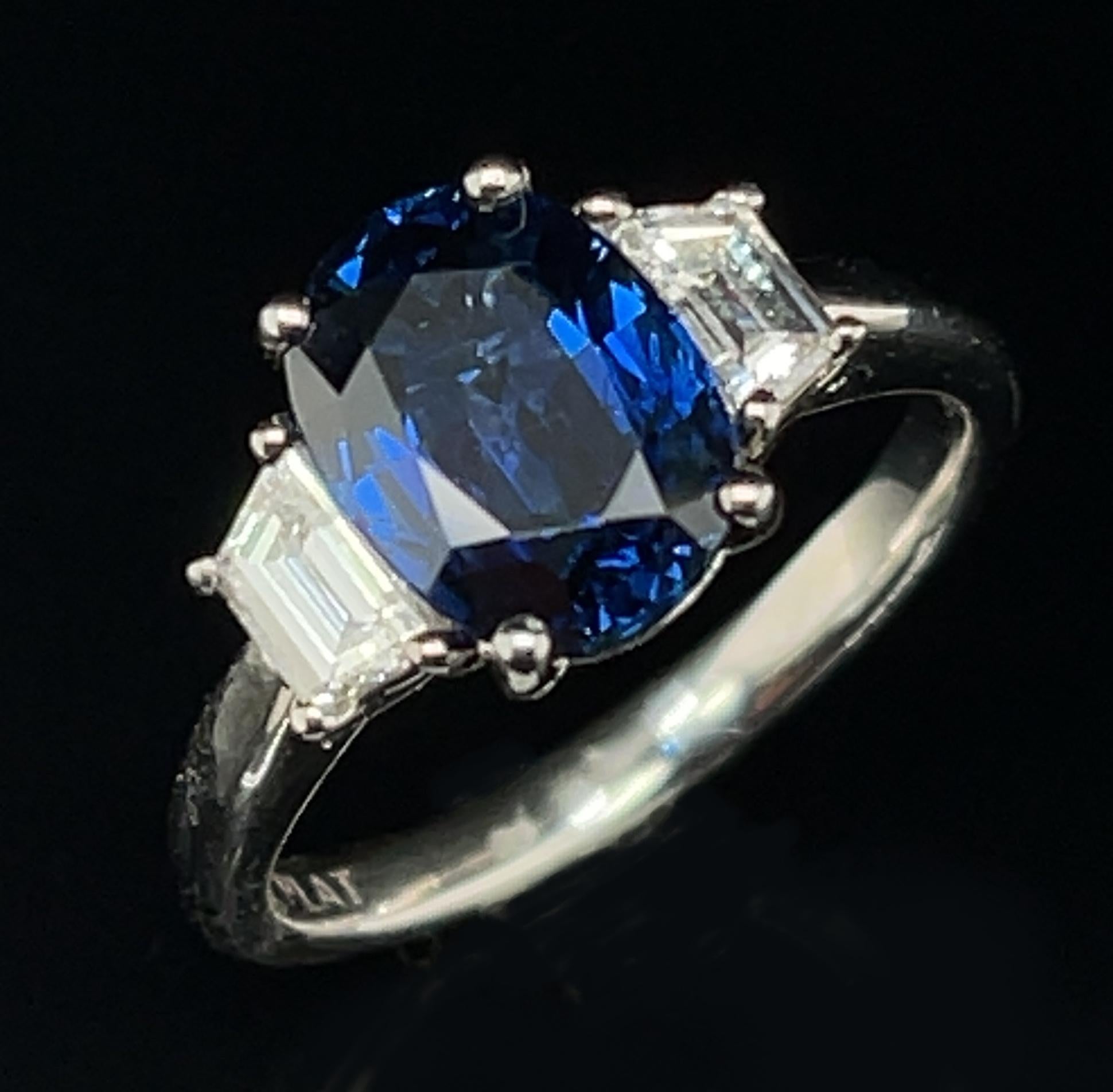 Oval Cut 2.18 Carat Blue Sapphire Diamond Trapezoid Three-Stone Platinum Engagement Ring  For Sale