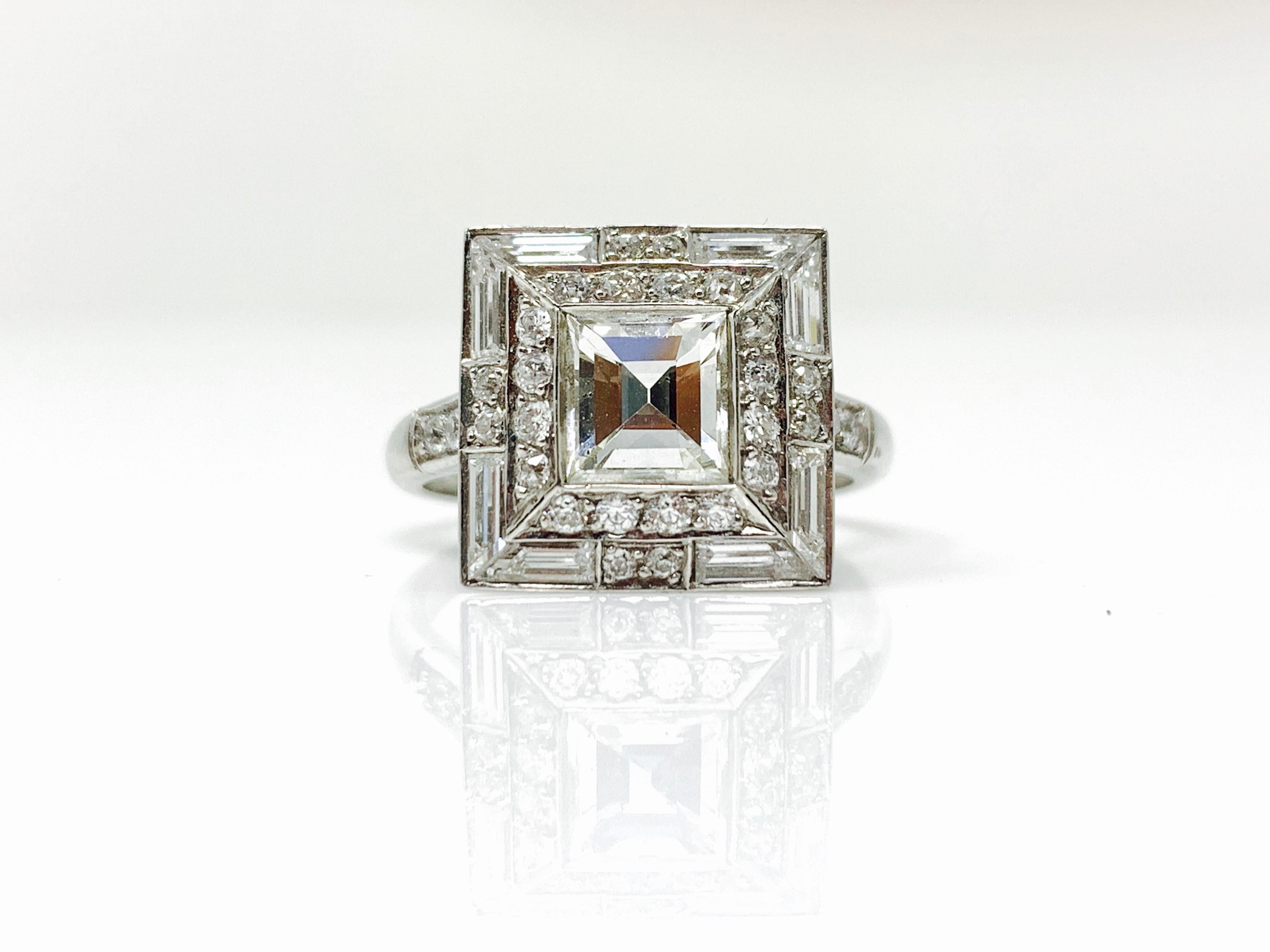 This unique and gorgeous engagement ring is handmade in platinum.  The details are as follows : 
Asscher cut diamond : 0.87 carat ( G color and VSclarity ) 
baguettes : 088 carat ( GH color and VS clarity ) 
white diamond : 0.43 carat 
Metal :