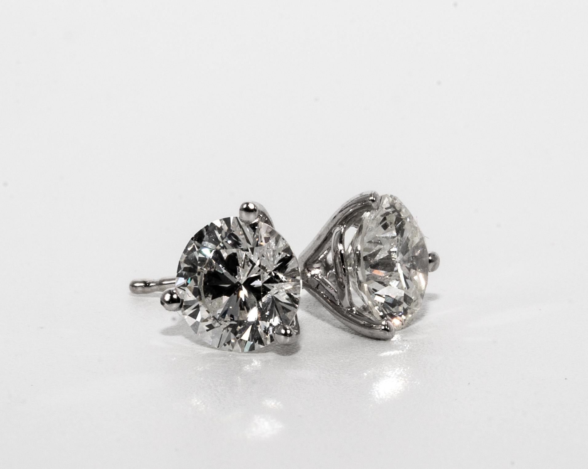2.18 Carat Diamond Stud earrings in 14K White Gold
3 Prong Martini setting allows the earrings to sit flush without sagging ( with friction backs)
Color is I SI3, inclusions not visible to the eye
6.5 MM Diameter, beautifully cut and perfectly