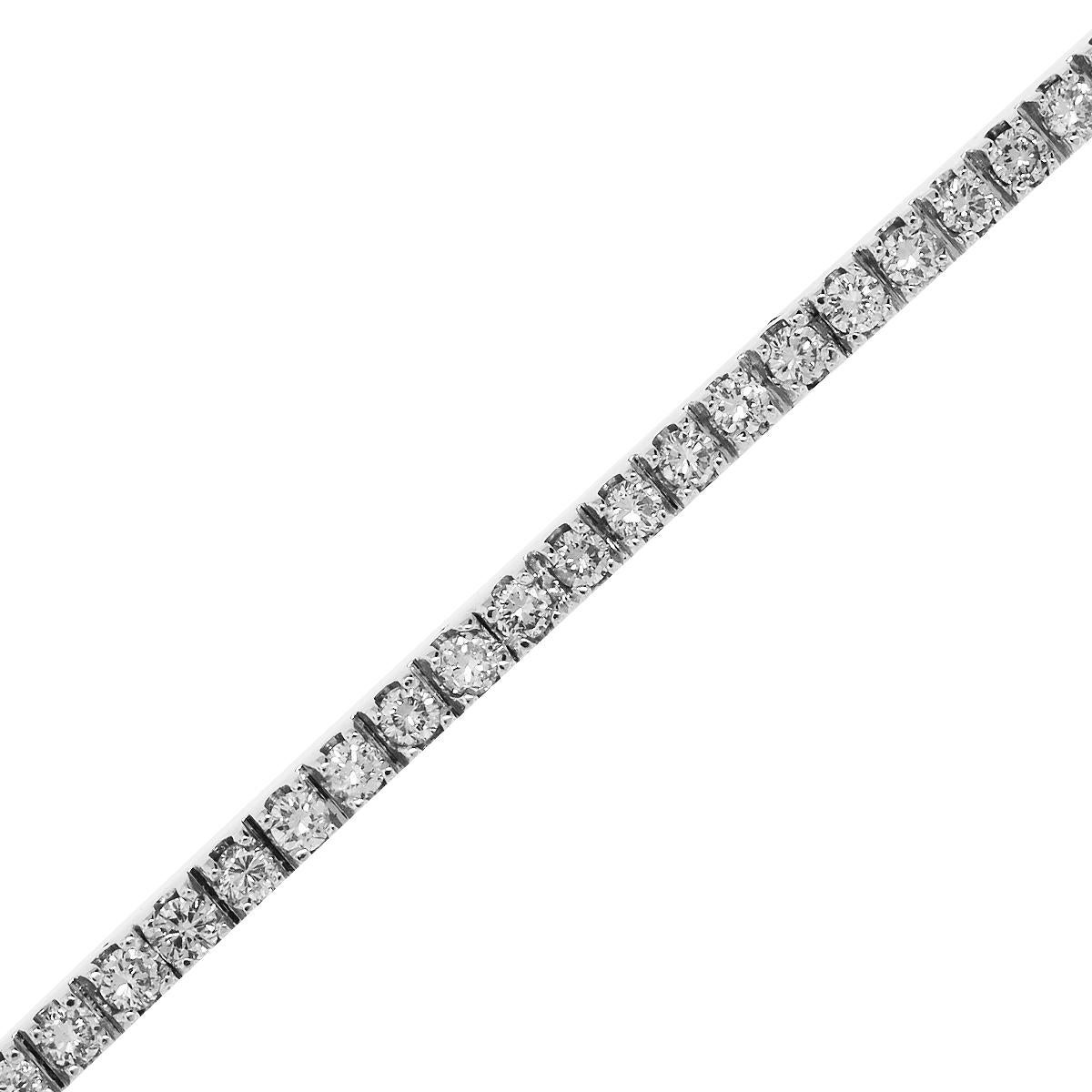 Material: 18k White Gold
Diamond Details: Approximately 2.18ctw round brilliant diamonds. Diamonds are G/H in color and VS in clarity.
Measurements: 7″
Clasp: Tongue in box clasp with safety latch
Total Weight: 12.9g (8.3dwt)
SKU: A30312874