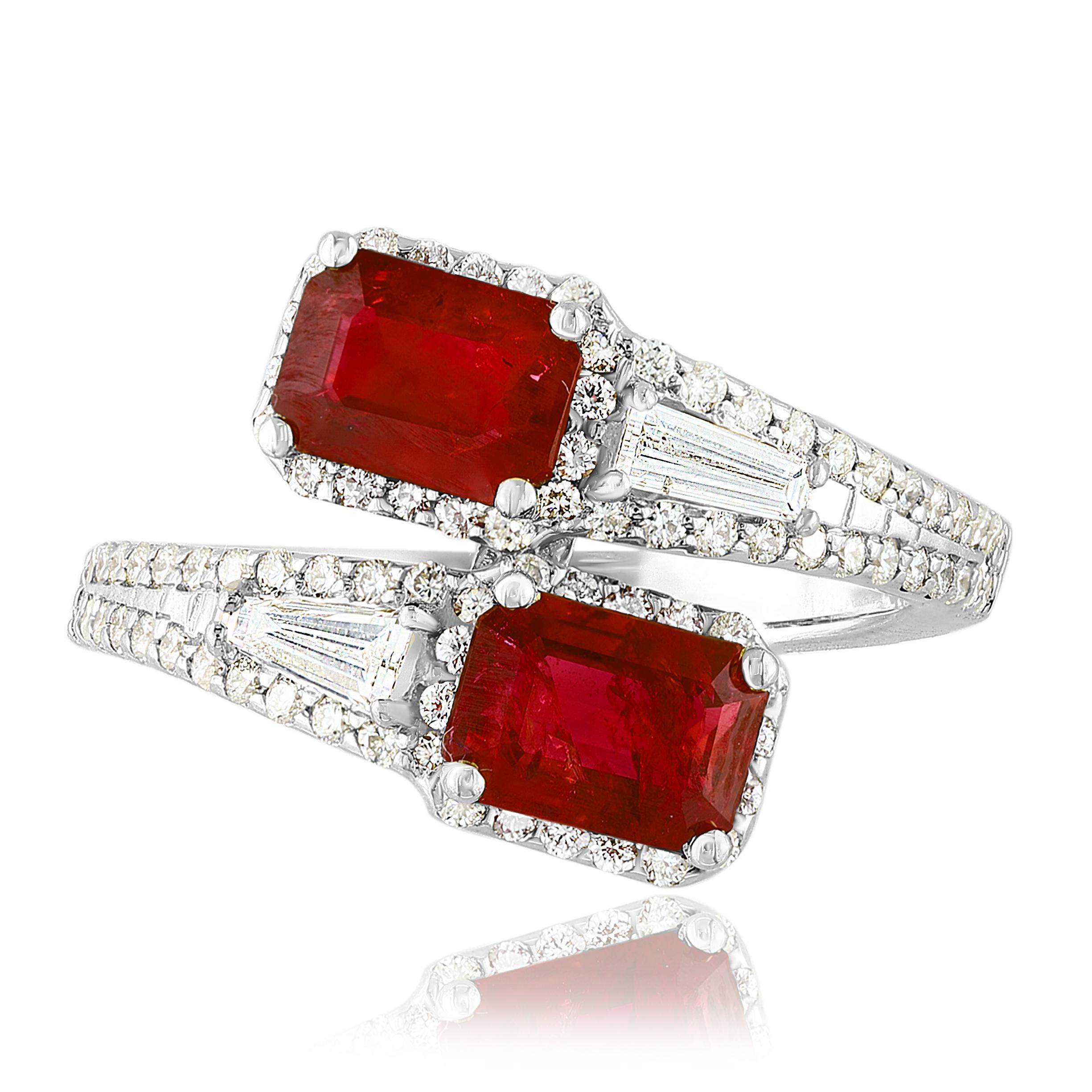 The stunning forever-together Toi et Moi ring features 2 Emerald cut Rubies embraced by east to west 2 baguette diamonds weigh and 84 round diamonds halfway to the shank. Handcrafted in 14k White Gold.
2 emerald cut Rubies in the center weighs 2.18