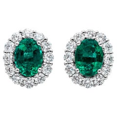 2.18 Carat Green Emerald and Diamond Halo Earrings in 18 Karat White Gold