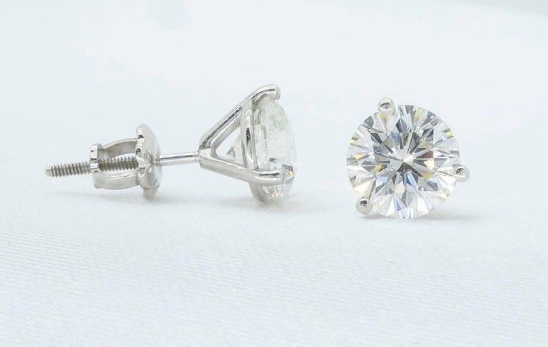 2 18 Carat Leo Diamond Stud Earrings For At 1stdibs This Beautiful Pair Of Leo Diamond Earrings Feature One 1 10ct Round With G H