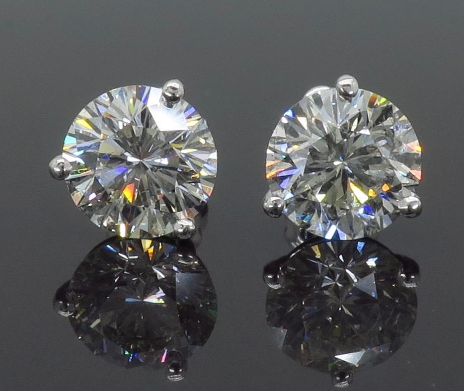 leo diamond earrings 1 ct