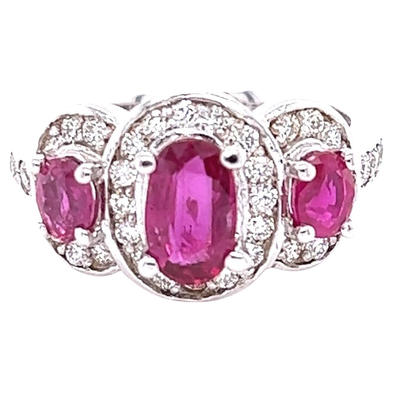 2.18 Carat Natural Oval Cut Ruby Diamond 18 Karat White Gold Three Stone Ring
