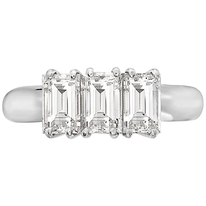 2.11 Carat Trilogy Platinum Emerald Cut Engagement Ring For Sale at