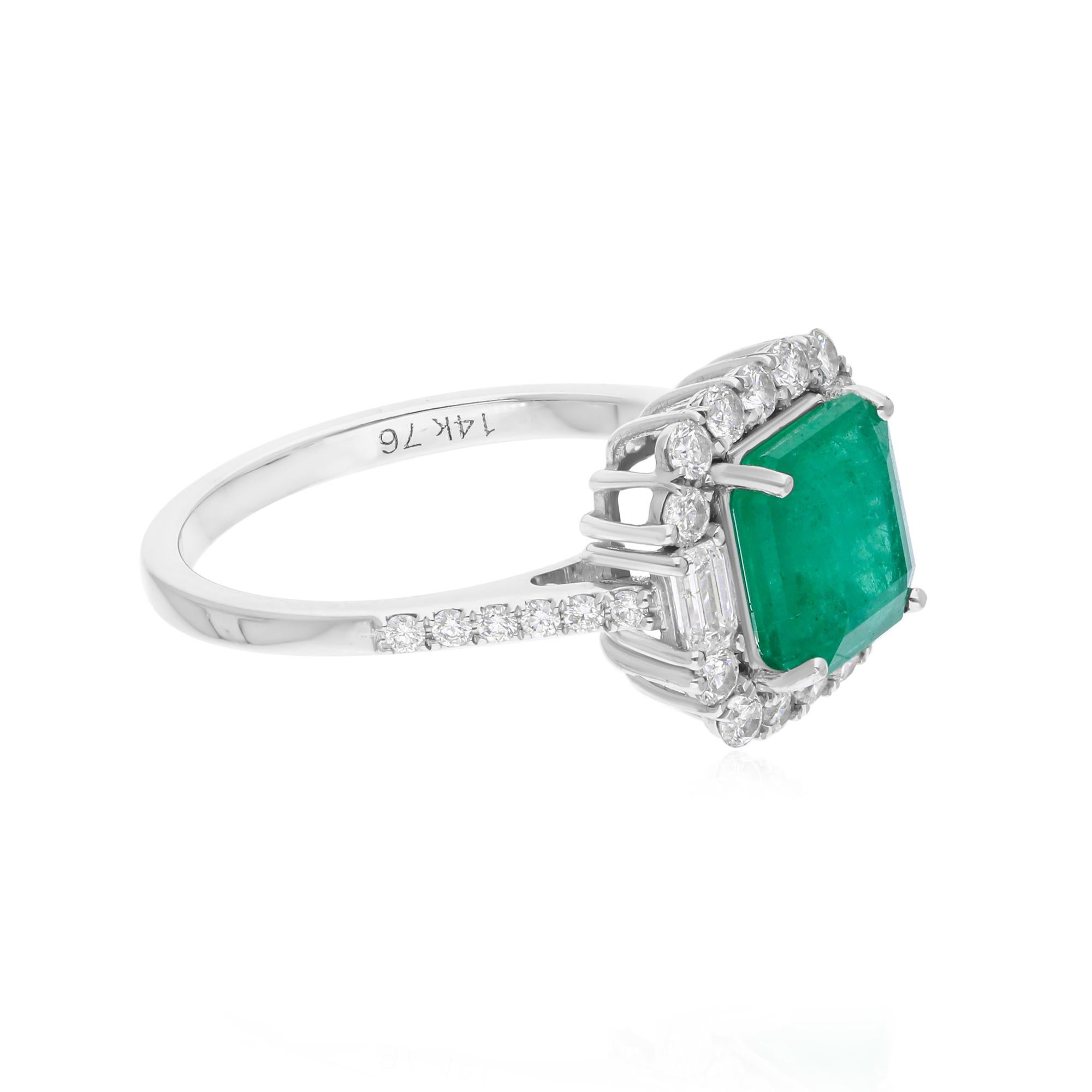 Cast from 14-karat gold, these exquisite ring is handset with 2.18 carats Zambian emerald and 0.63 carats of sparkling diamonds.

The ring is a size 7 US and may be resized to larger or smaller upon request. FOLLOW SPECTRUM JEWELS storefront to view