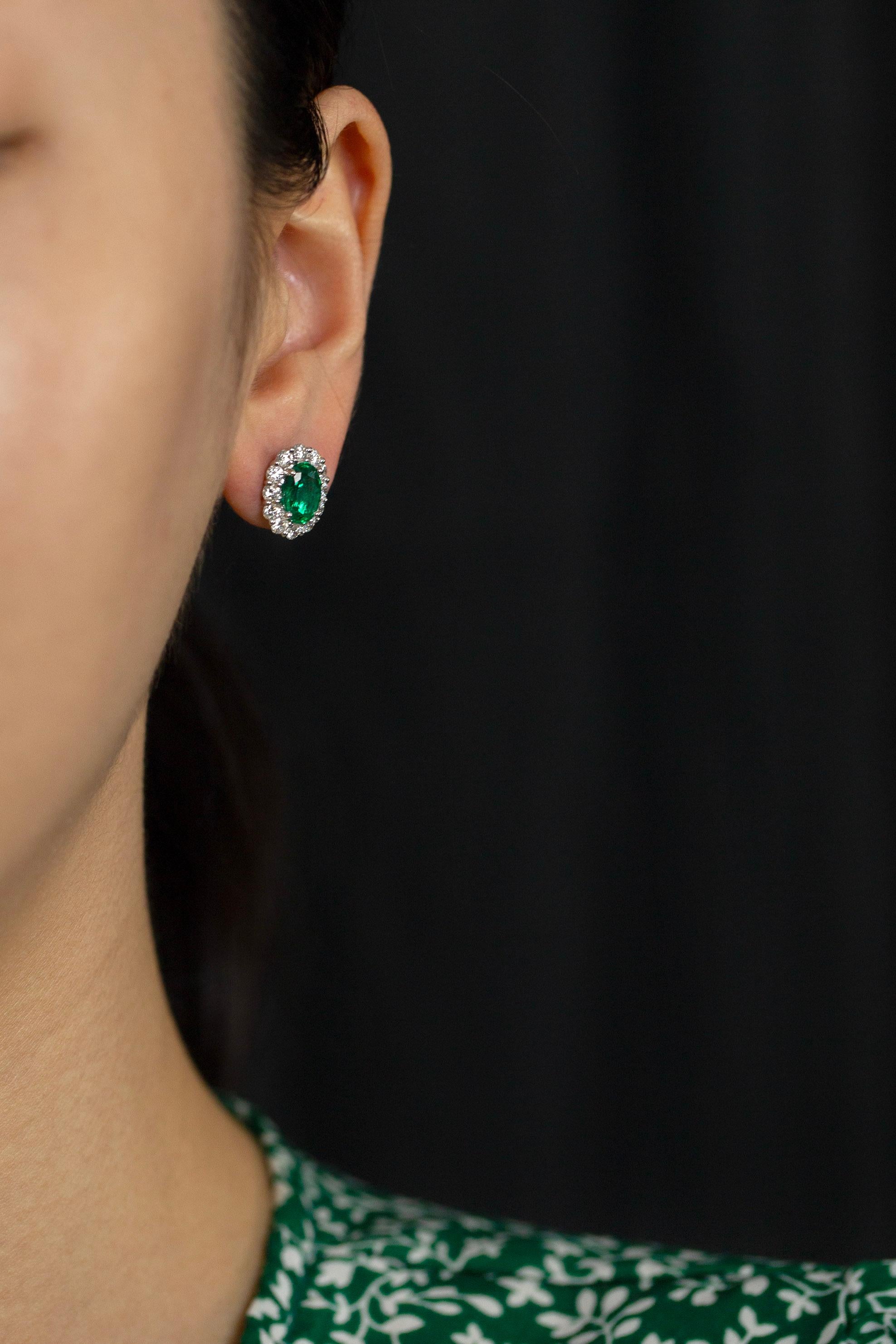 Mixed Cut 2.18 Carats Total Oval Cut Green Emerald and Diamond Halo Stud Earrings For Sale