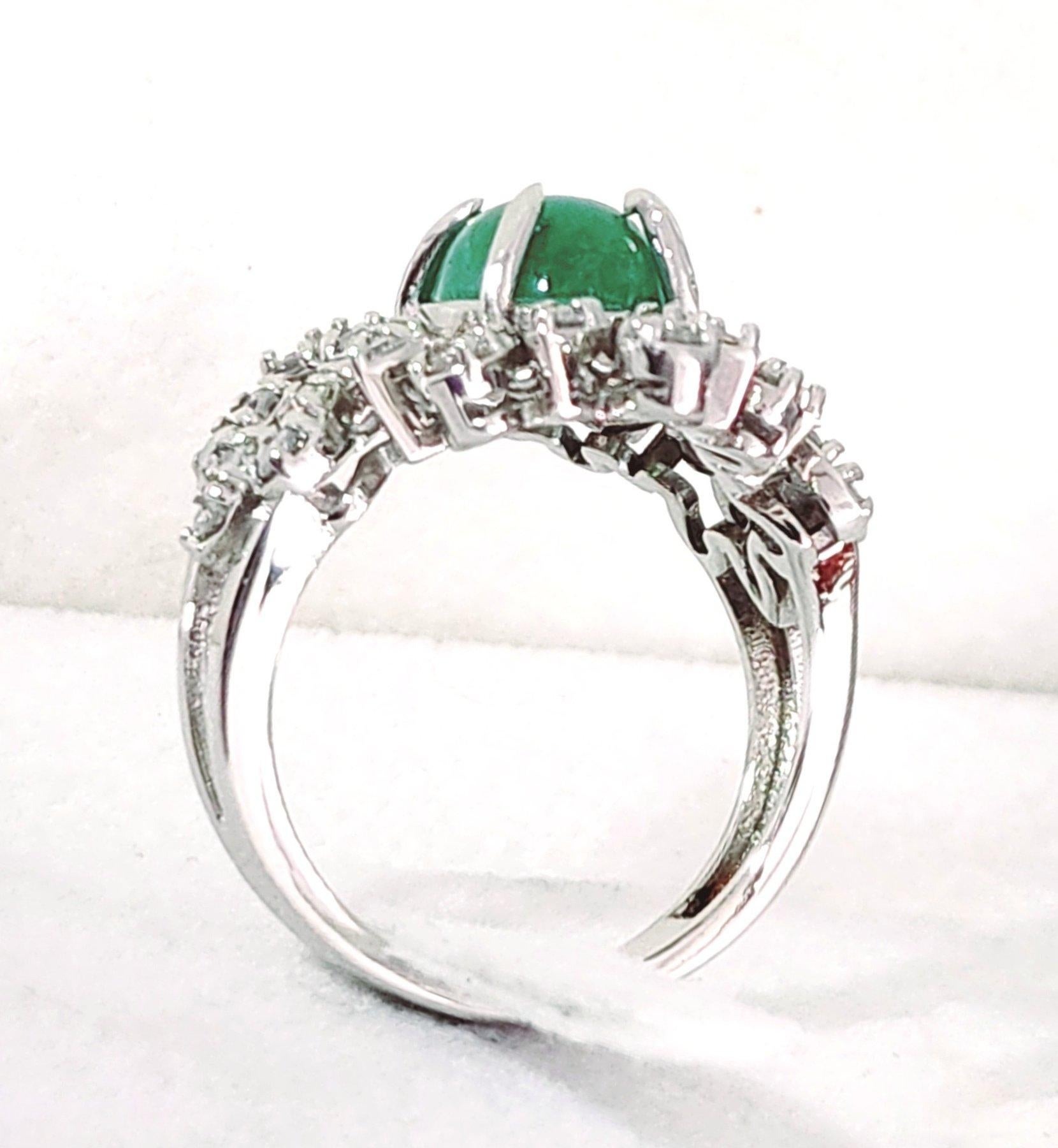 A special Emerald and Diamonds ring made of 14K white gold.
In the center of the ring is set a natural Emerald stone of 2.18 ct in the shape of an oval cabochon.
Around the emerald, the ring is decorated with marquise and pear shapes in which are