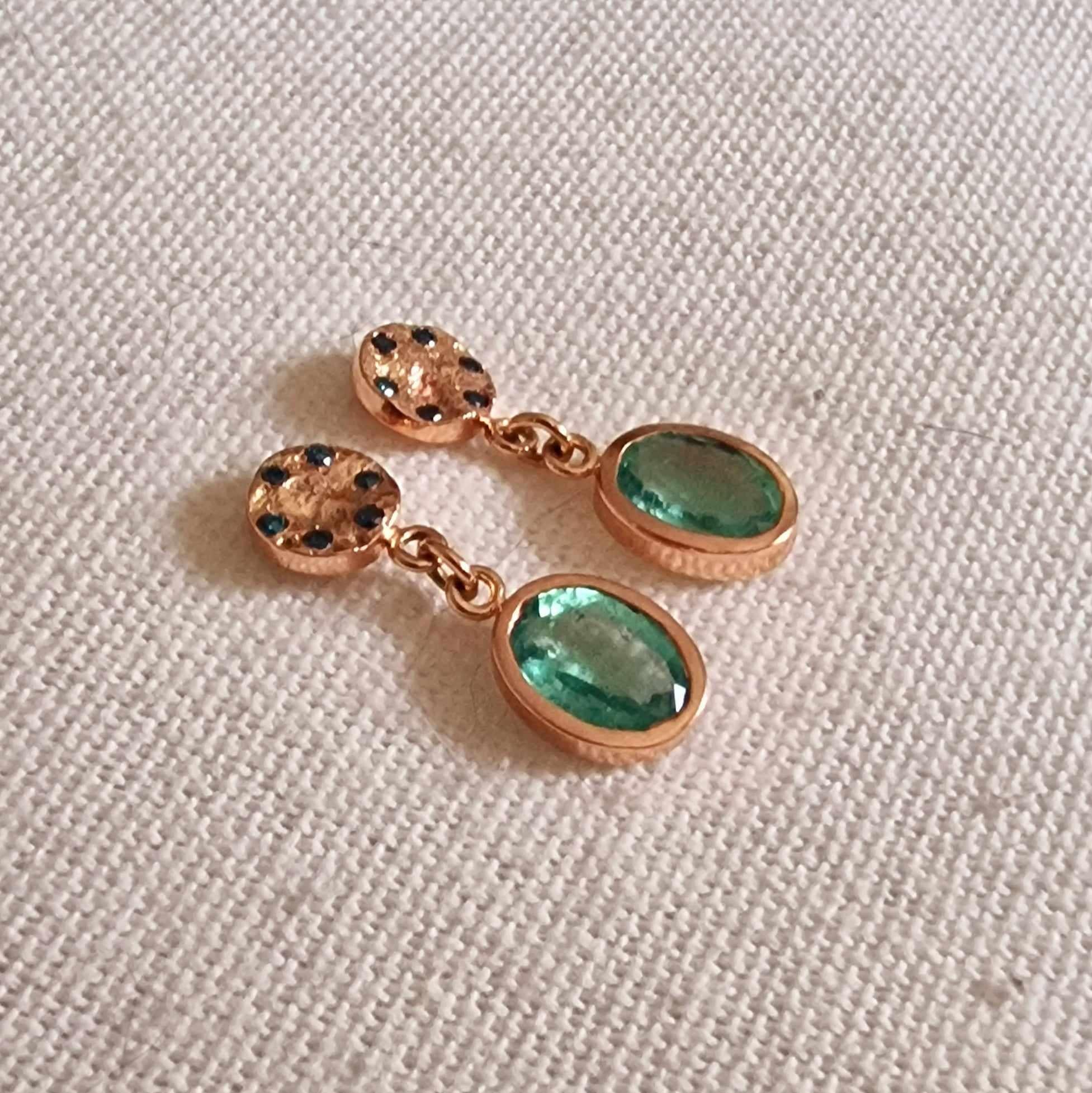 One-of-a-kind emerald and blue diamonds earrings, a unique pair of earrings that is ready to wear. Created with a design meant to be easy to wear everyday or to complete a smart attire! 

Elegant drop and dangle earrings featuring oval cut green