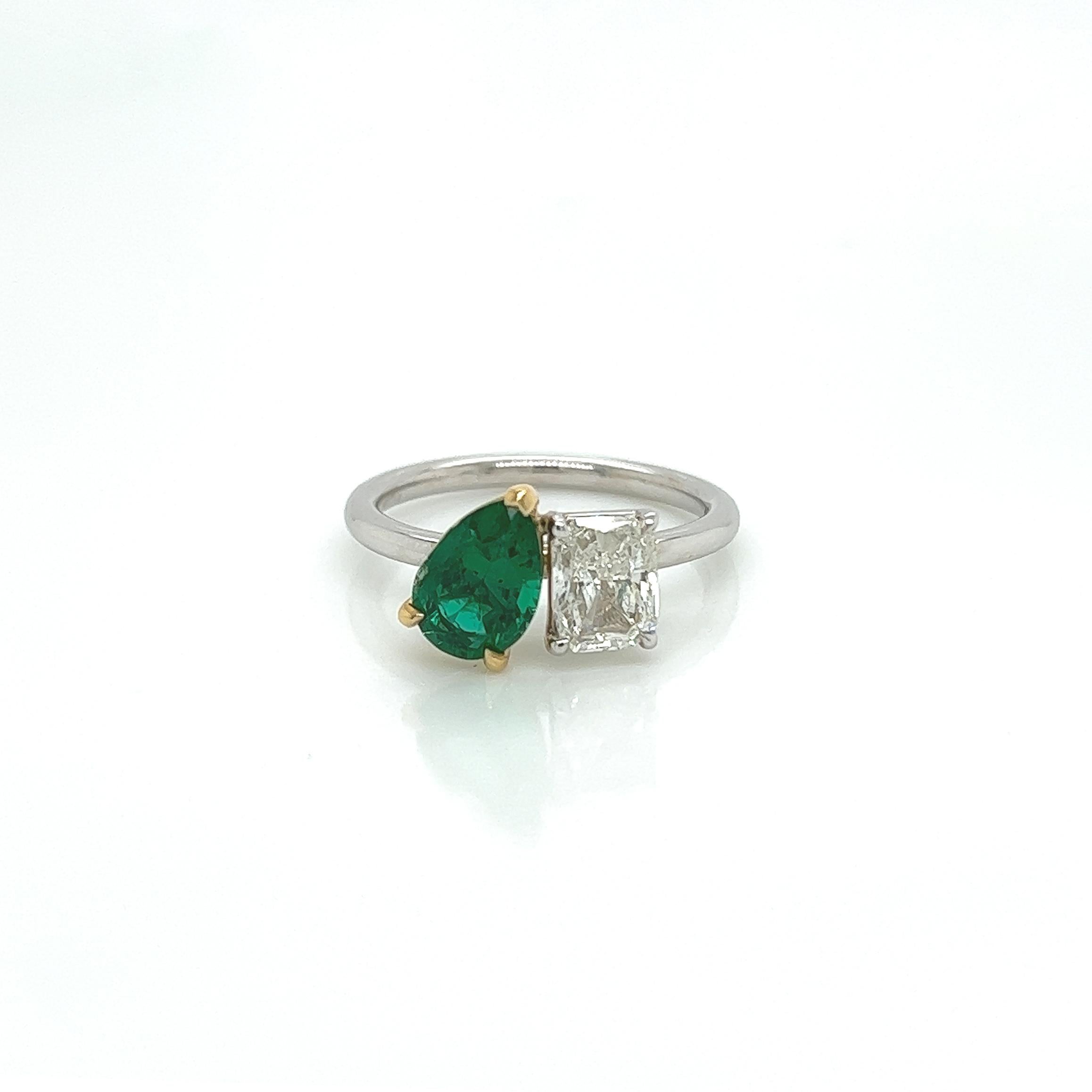 2.18 Total Carat Two-Stone Emerald and Diamond Ladies Ring in 18K White Gold, GIA Certified

This two-stone ring is a truly splendid piece of jewelry. Featuring an elegant 1.18 Carat Pear cut green emerald nestled beside a 1 Carat Radiant cut