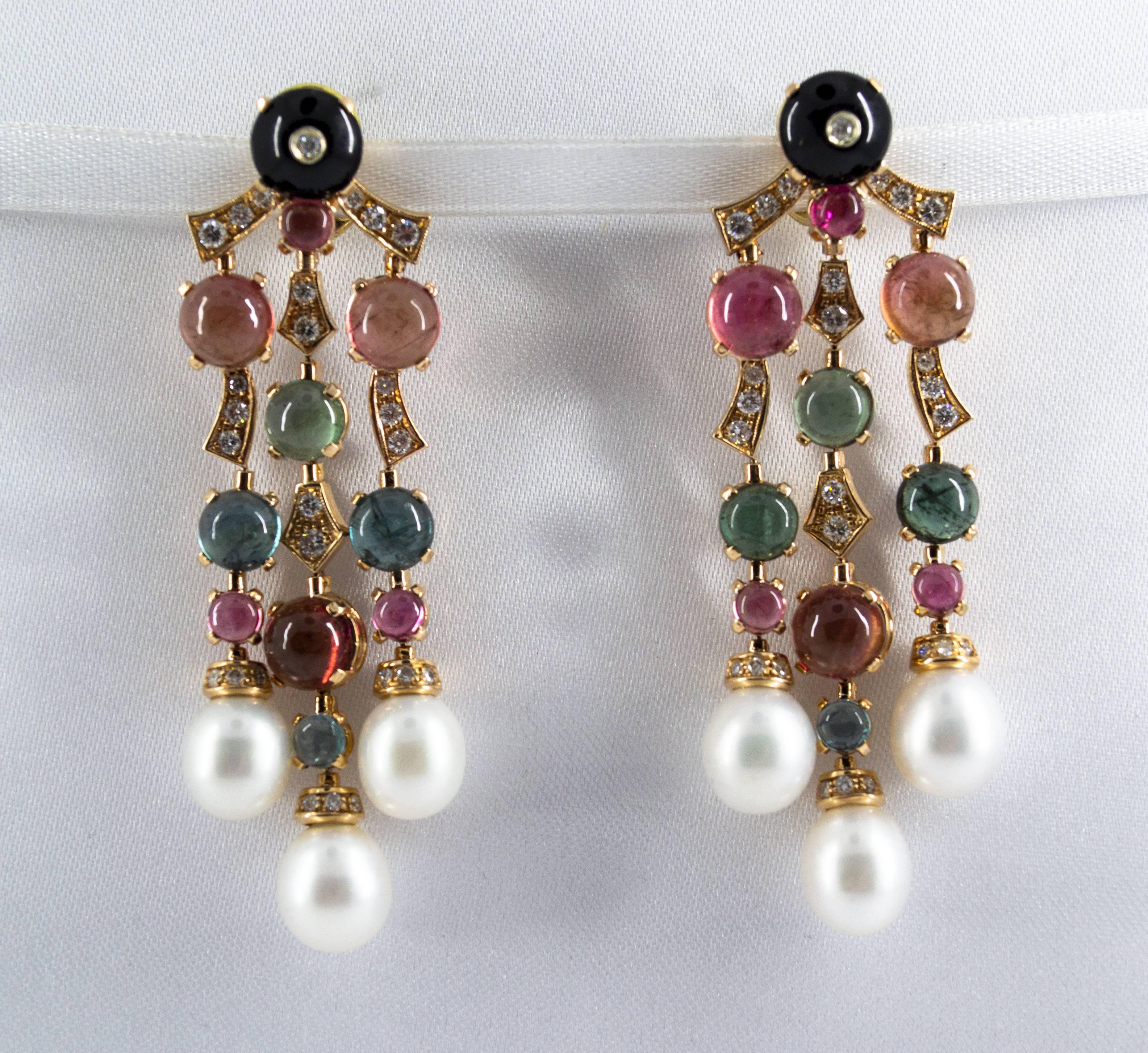 These Clip-On Earrings are made of 14K Yellow Gold.
These Earrings have 1.05 Carats of White Diamonds.
These Earrings have 21.80 Carats of Tourmalines.
These Earrings have also Pearls and Onyxes.
All our Earrings have pins for pierced ears but we