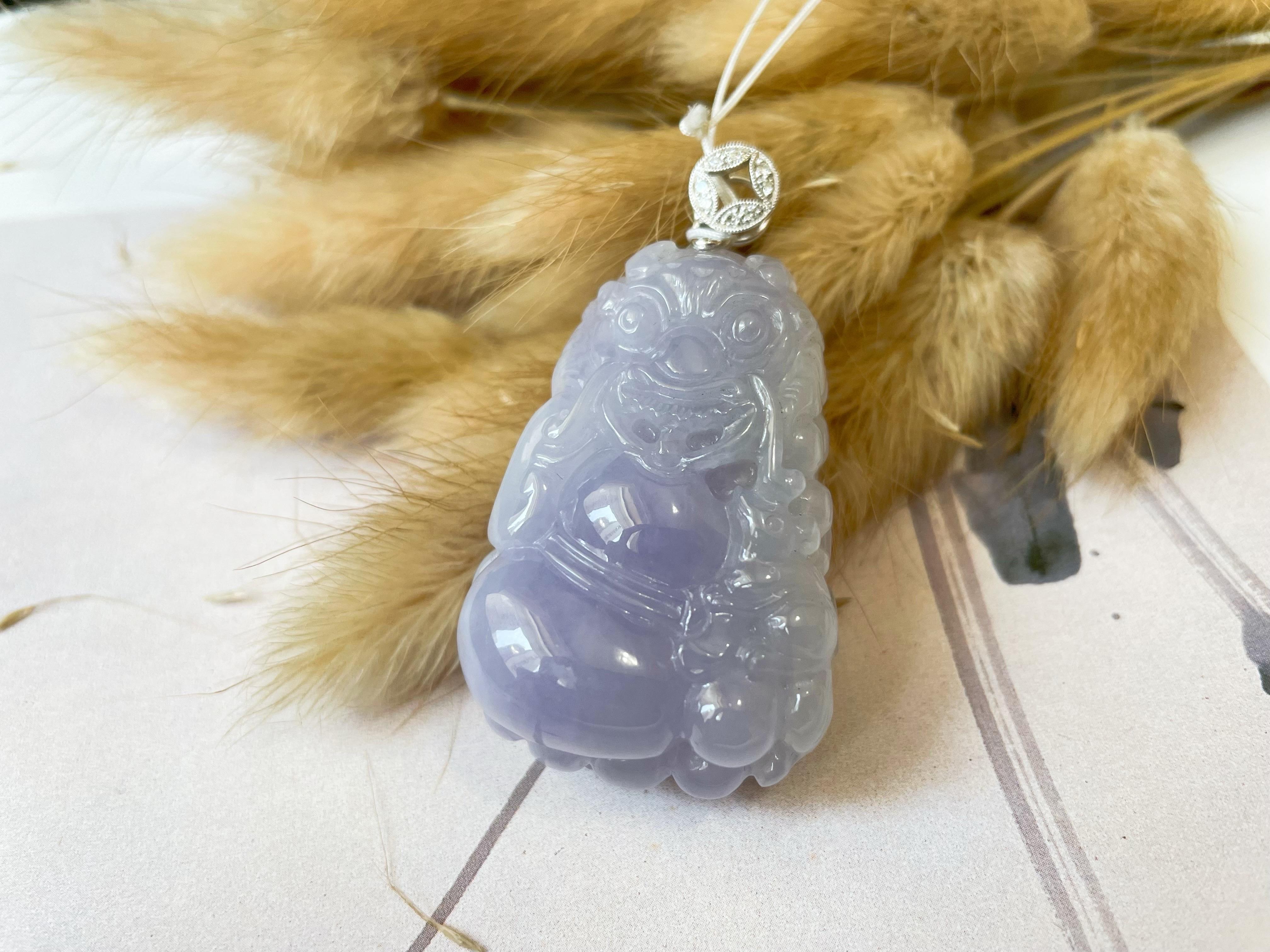Indulge in a truly unique and exquisite work of art with this beautiful lavender-carved Qilin jadeite. This stunning piece is 100% natural, untreated, and undyed Type-A from Myanmar, ensuring its authenticity and value.

Crafted with precision and