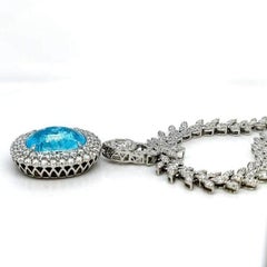 Collana con tormalina Paraíba blu-verdastro intenso da 21,85 ct, oro 18 carati, certificato GIA