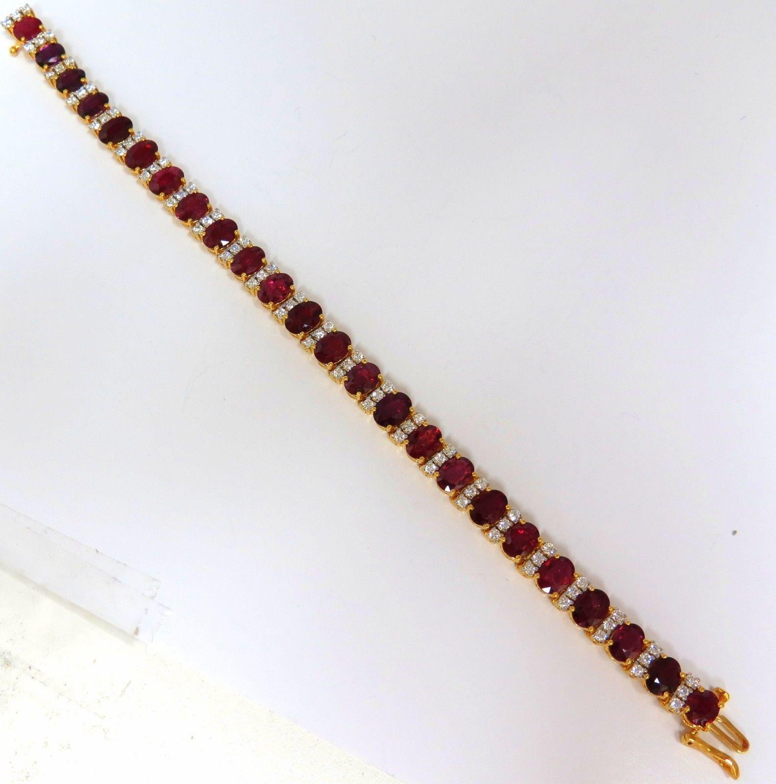 Classic Oval Tennis Bracelet  

19.80ct. Natural Ruby Tennis Bracelet

Red, Transparent & oval cut.

Mozambique origin

6.8 X 5.3mm - 5.5 X 4.5mm

Clean Clarity and very good cut.



2.05ct. diamonds:

Rounds, G color Vs-2 clarity.

14kt. yellow