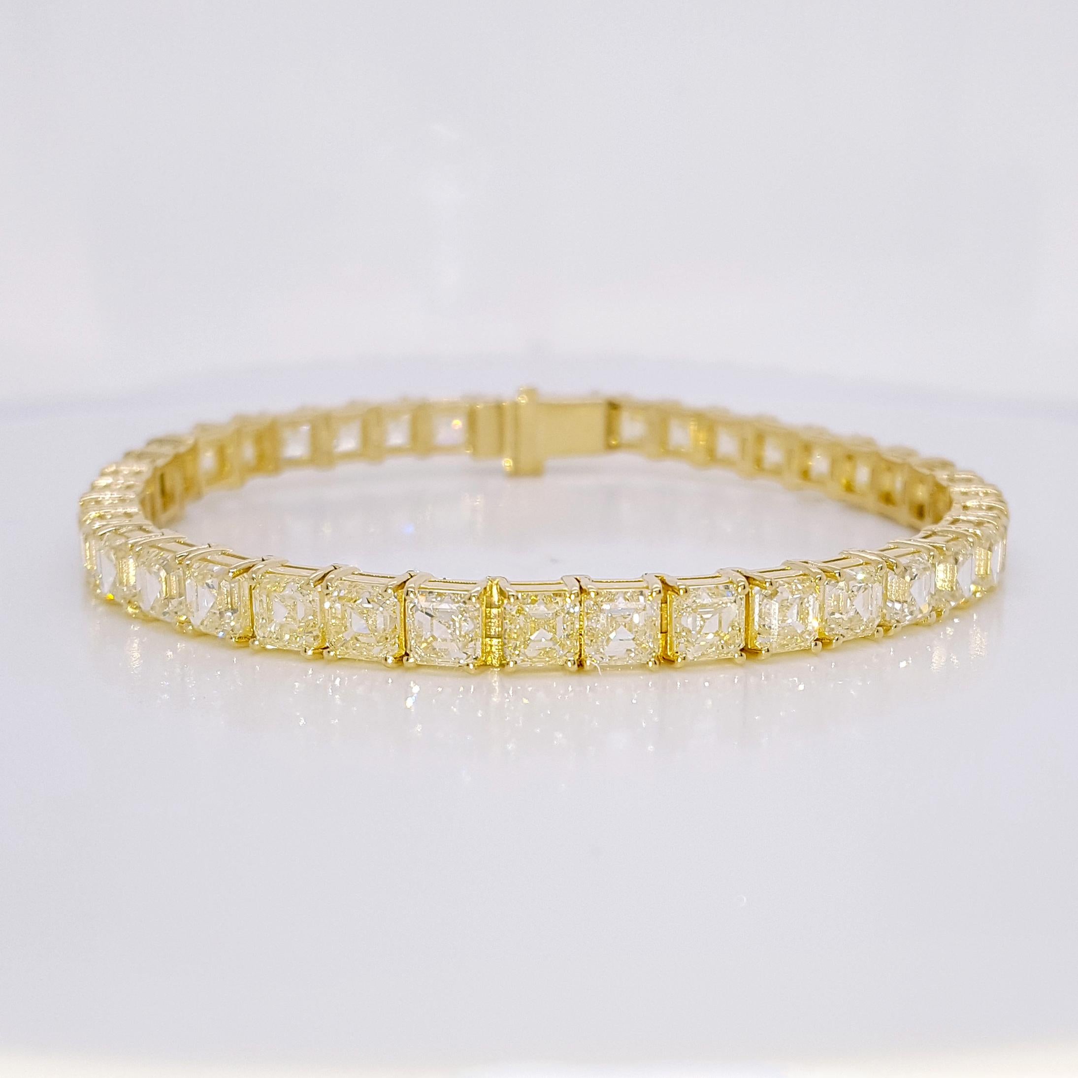 Introducing our stunning Asscher Cut Yellow Diamond Tennis bracelet, This exceptional bracelet features a total of 39 exquisite Asscher cut yellow diamonds, each diamond weighing approximately 0.56 carat. The bracelet total weight is 21.88 carats,