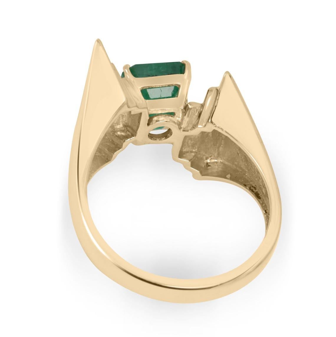 The Divergent solitaire emerald statement ring is a true masterpiece, designed to captivate with its bold and artistic form. Showcasing a lush dark-green emerald-cut emerald, the gemstone is securely nestled in a four-prong claw setting, allowing