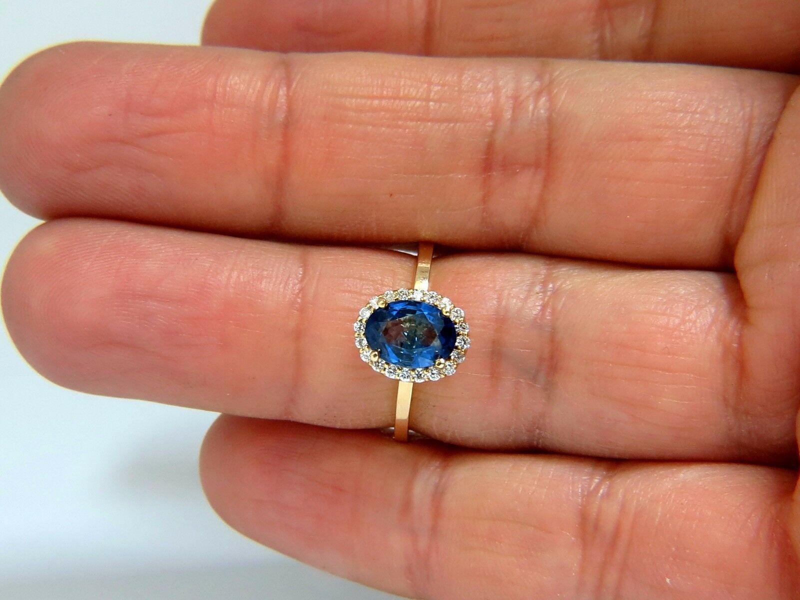 Oval Cut 2.18 Carat Natural Vivid Blue Sapphire Diamonds Ring 18 Karat Petite Halo For Sale
