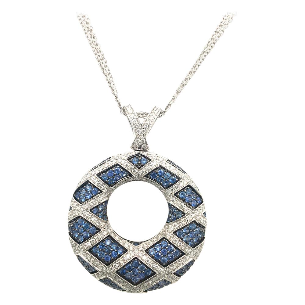 2.19 Carat Blue Sapphire and 1.28 Round Diamonds Pave Circle Pendent White Gold For Sale