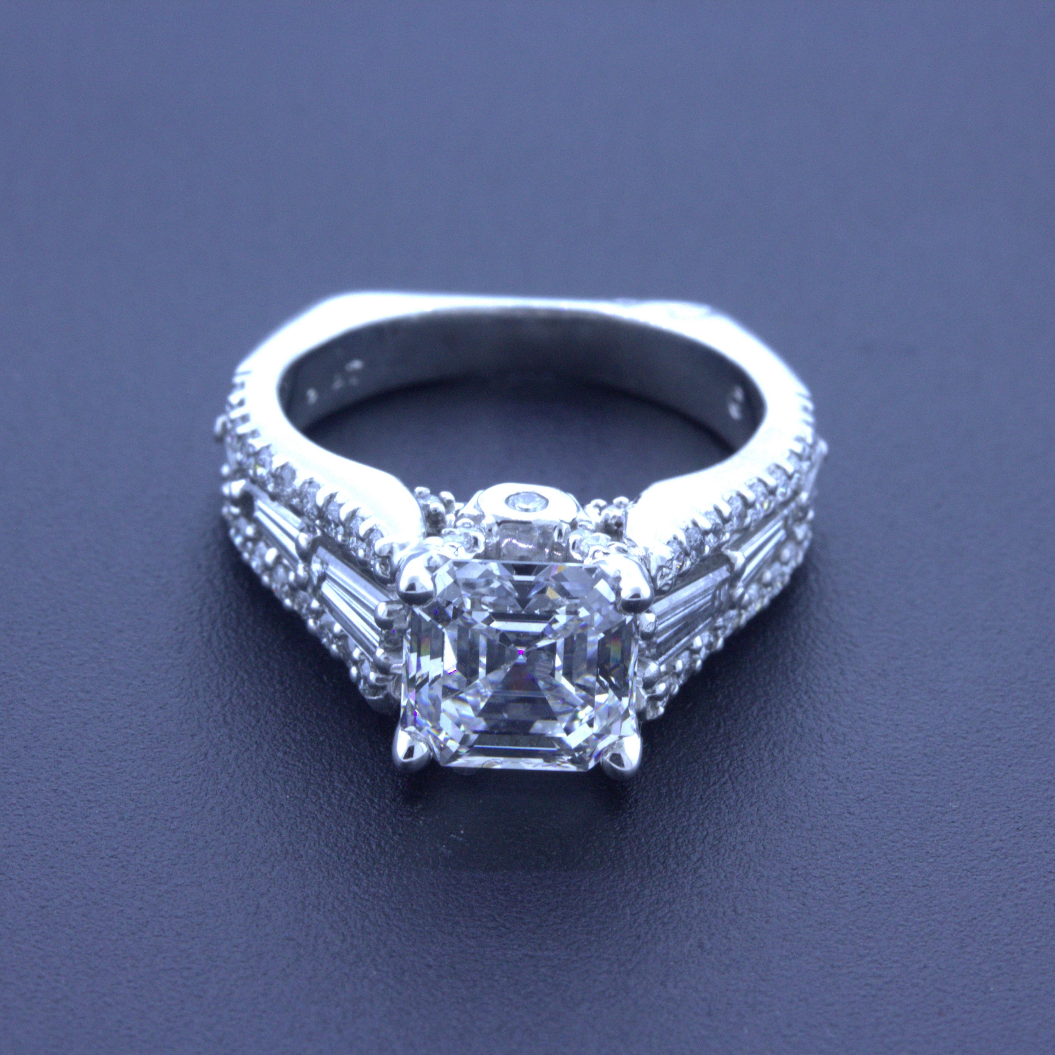 Say yes to this lovely platinum engagement ring featuring a very fine 2.19 carat Asscher-cut diamond. It has the top possible color grade of D along with strong clarity, VS2. The diamonds are bright white and pop with sparkle and brilliance. It is