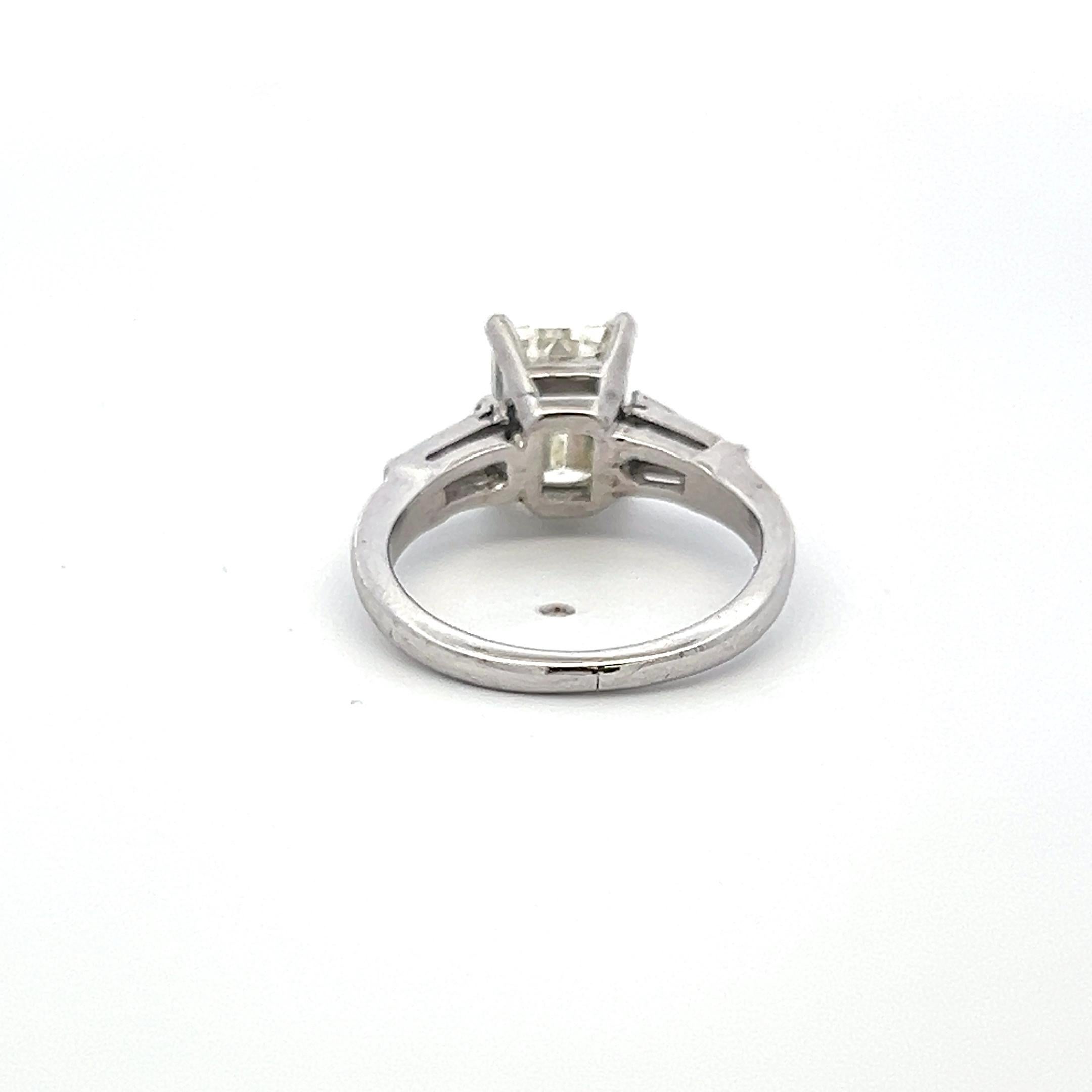 2.19 Carat Emerald Cut and Tapered Baguette Diamond Platinum Engagement Ring In Good Condition For Sale In New York, NY