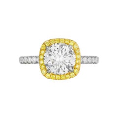 2.19 Carat GIA round with Diamond Halo Fancy Intense Yellow Engagement Ring 