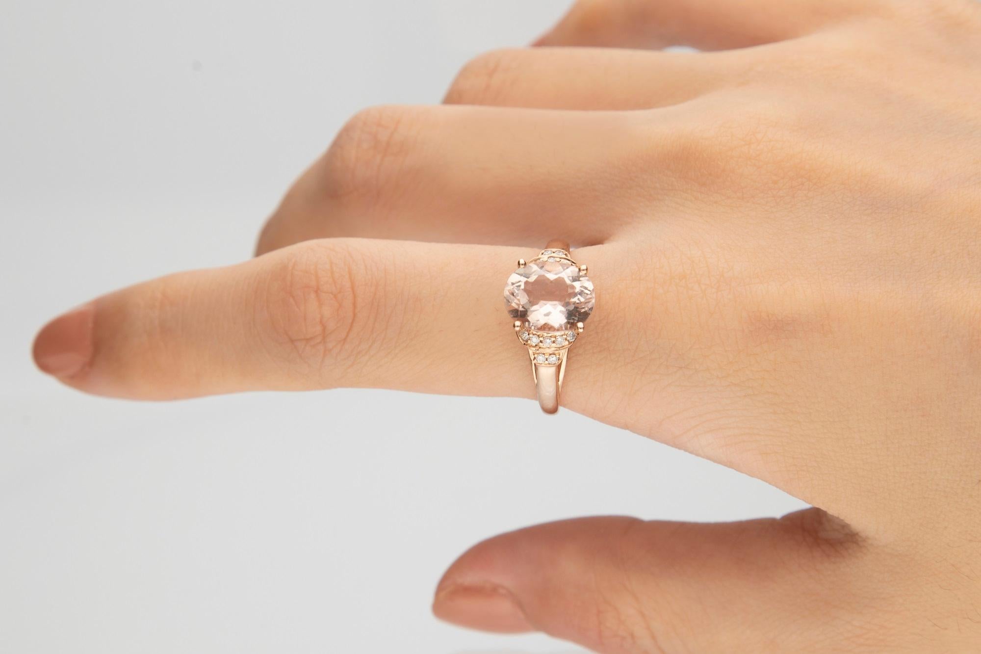 Tickle her pink with this oval-cut Genuine morganite and Gin& Grace Natural diamond ring. Offering a band crafted from 10k rose gold with a high-polish finish, the ring displays an impressive oval-cut Genuine morganite surrounded by 16 round-cut