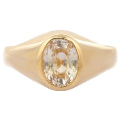 2.19 Carat Oval Cut Yellow Sapphire Solitaire Ring in 18 Karat Yellow Gold