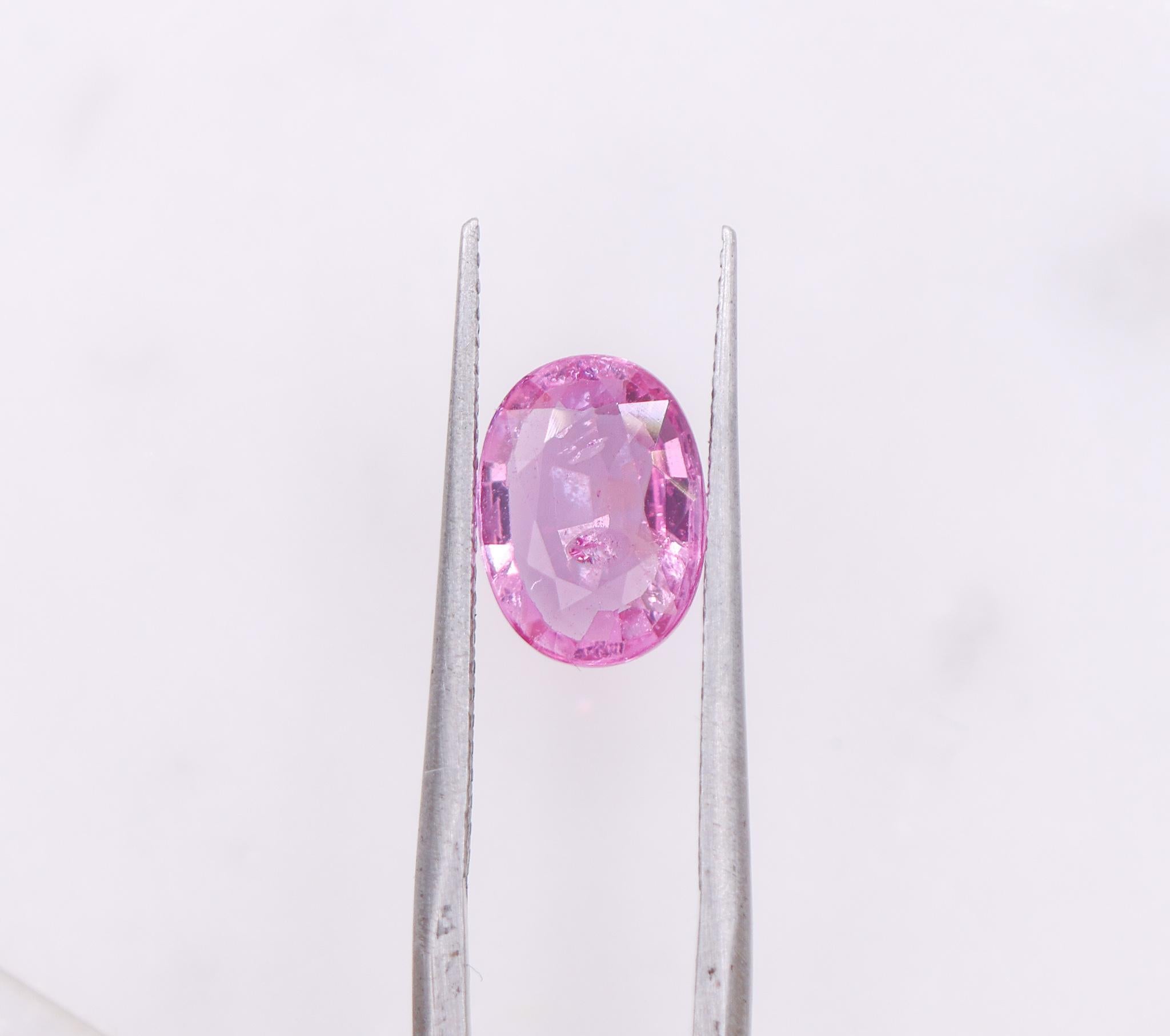 NNJ Designs presents a 2.19 carat oval Pink Sapphire loose gemstone! This Pink Sapphire gemstone would be perfect for the jewelry setting of your choice and can be a lovely September birthstone gift for your loved