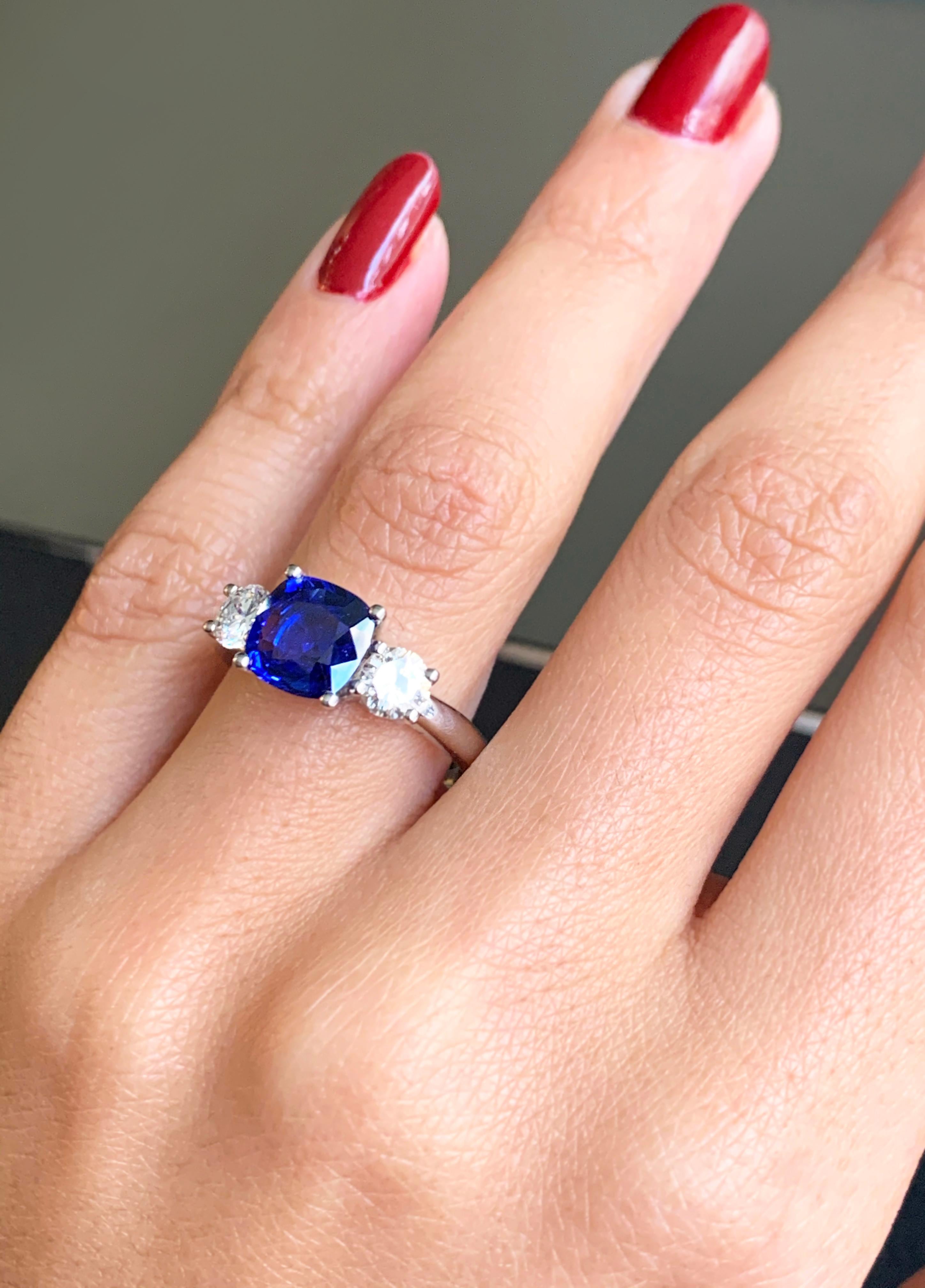 Women's 2.19 Carat Sapphire and Diamond Three-Stone Platinum Engagement Ring For Sale