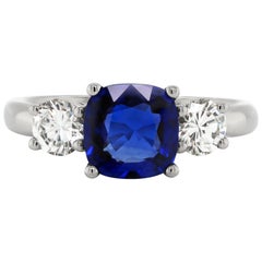 Used 2.19 Carat Sapphire and Diamond Three-Stone Platinum Engagement Ring