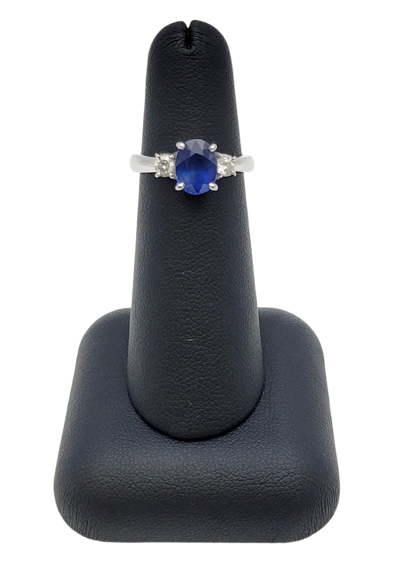 2.19 Carats Total Oval Natural Blue Sapphire and Round Diamond Three Stone Ring For Sale 3