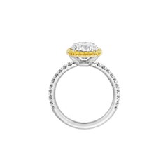 2.19 Carat GIA round with Diamond Halo Fancy Intense Yellow Engagement Ring