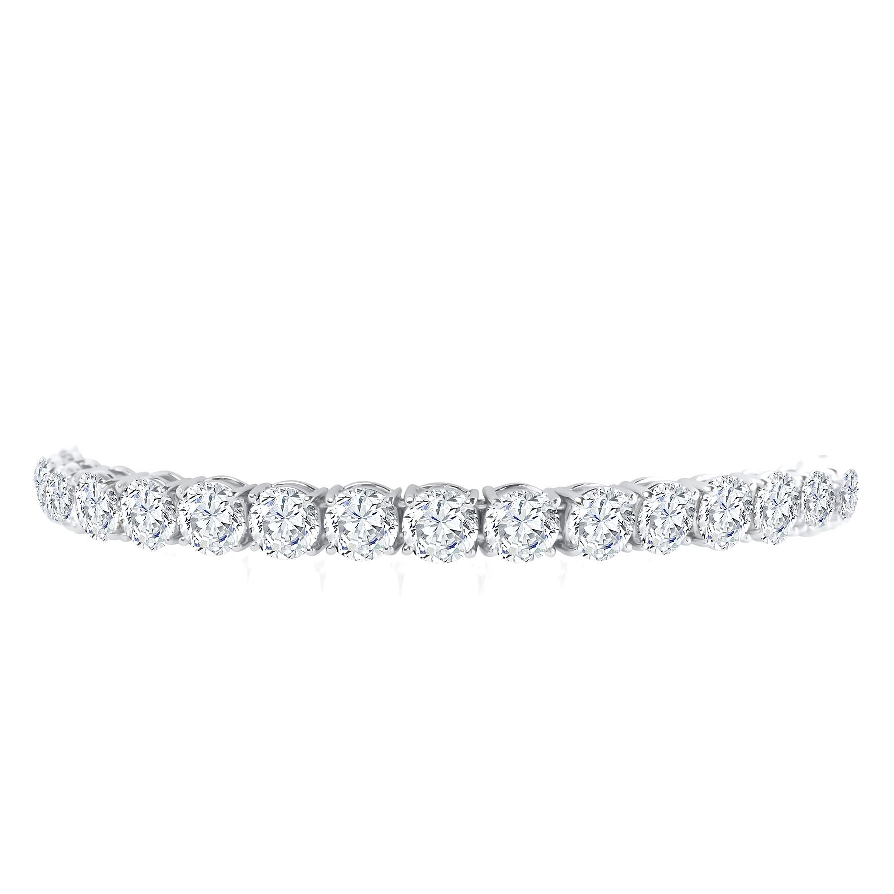 This one of a kind tennis bracelet features 31 ideal brilliant cut diamonds set in hand made platinum. The diamonds in this stunner are E-G color and si clarity. With a 21.90 total carat weight 

Feel free to reach out to us for more information