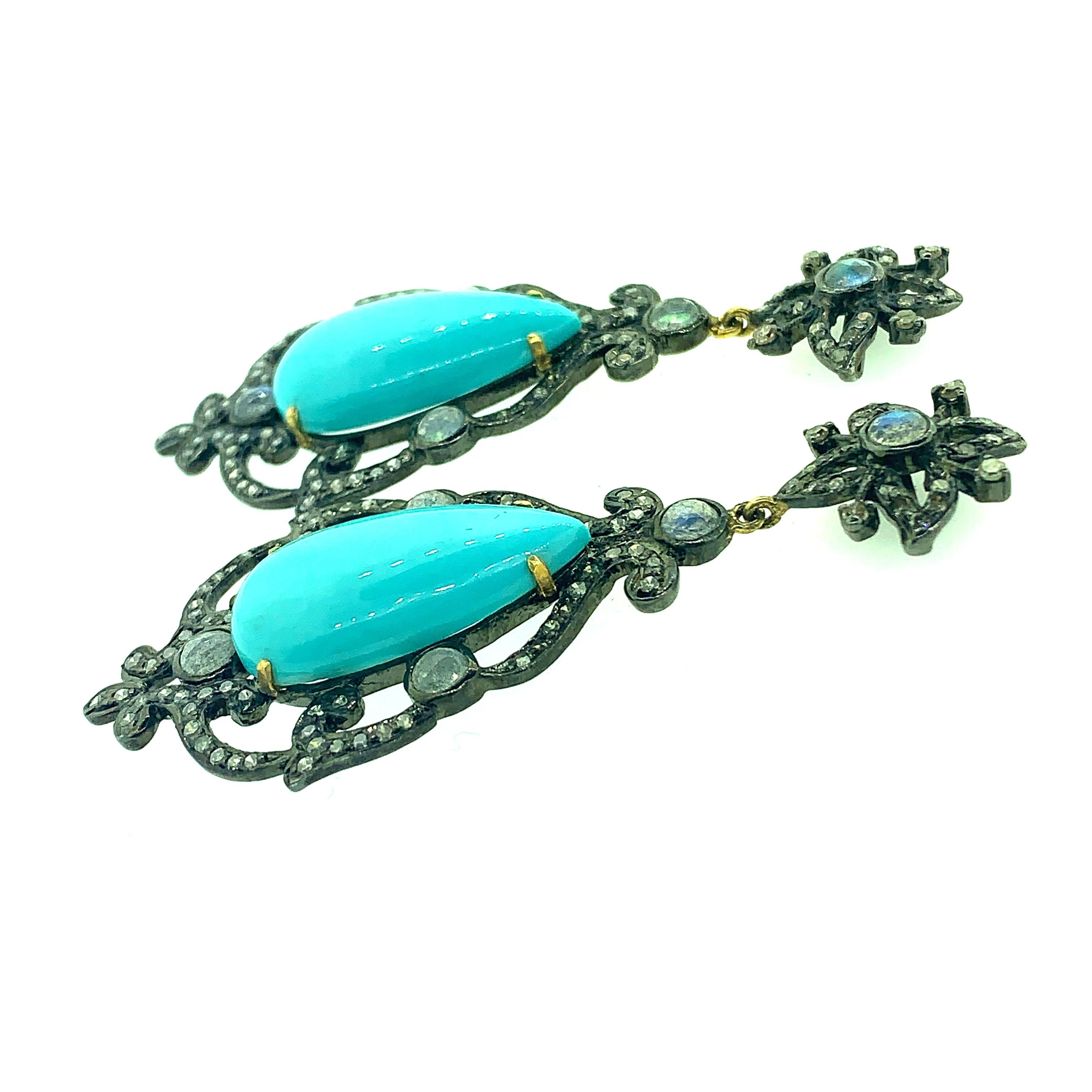 21.90ct Turquoise, 2.40 ct Labradorite and 1.62 ct Champagne Diamond Earring set in Oxidized Sterling Silver with post in pure 14K Gold. The turquoise is set firmly with four 14K Gold Prongs. The labradorite are bezel set and the diamonds are pave