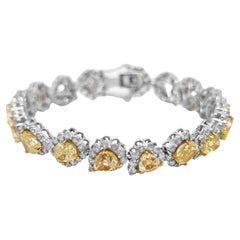 Bracelet en or blanc avec diamants jaunes et blancs de 21,91 carats