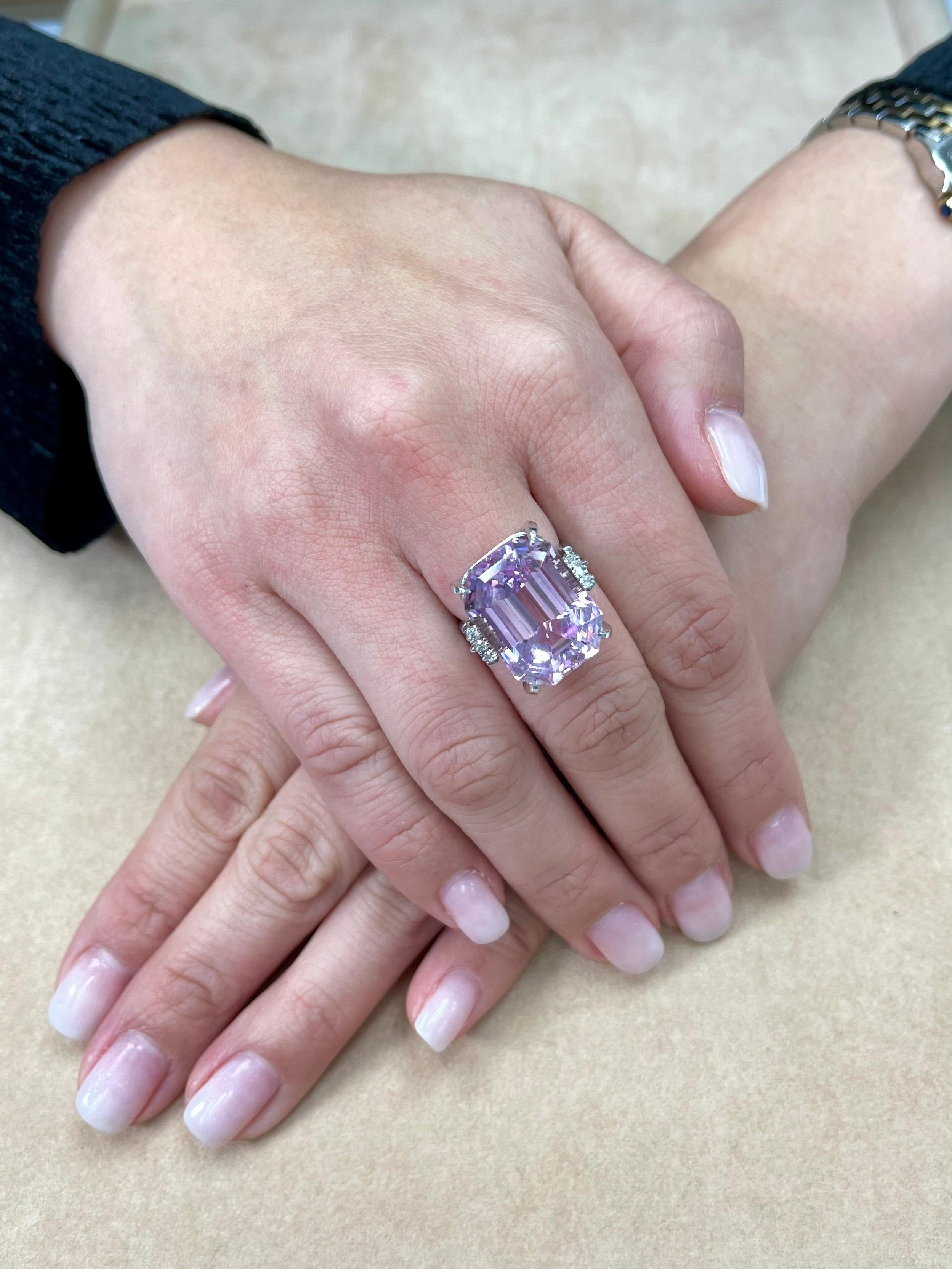 Please check out the HD video. The kunzite is a very nice pink! This Kuzite diamond cocktail ring will get you tons of compliments. Oversized at almost 22cts. The ring is set in platinum and diamonds. There are 0.10cts of diamonds used in this