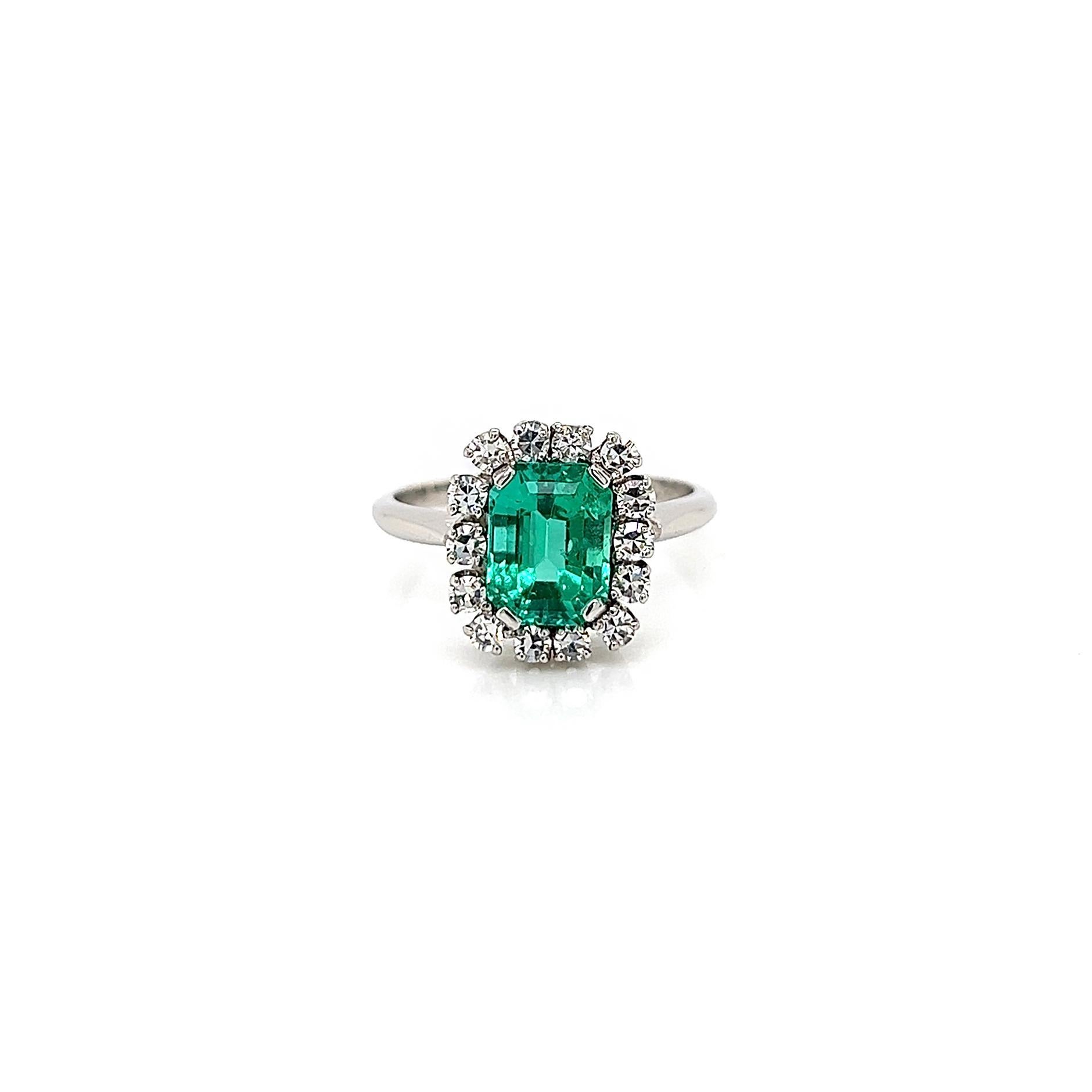 2.19 Total Carat Green Emerald and Diamond Engagement Ring, GIA Certified

-Metal Type: Platinum
-1.67 Carat Emerald Cut Columbian Green Emerald, GIA Certified
-0.52 Carat Single Cut Natural Diamonds, F-G Color, VS-SI Clarity
-Size 6.25

Made in New