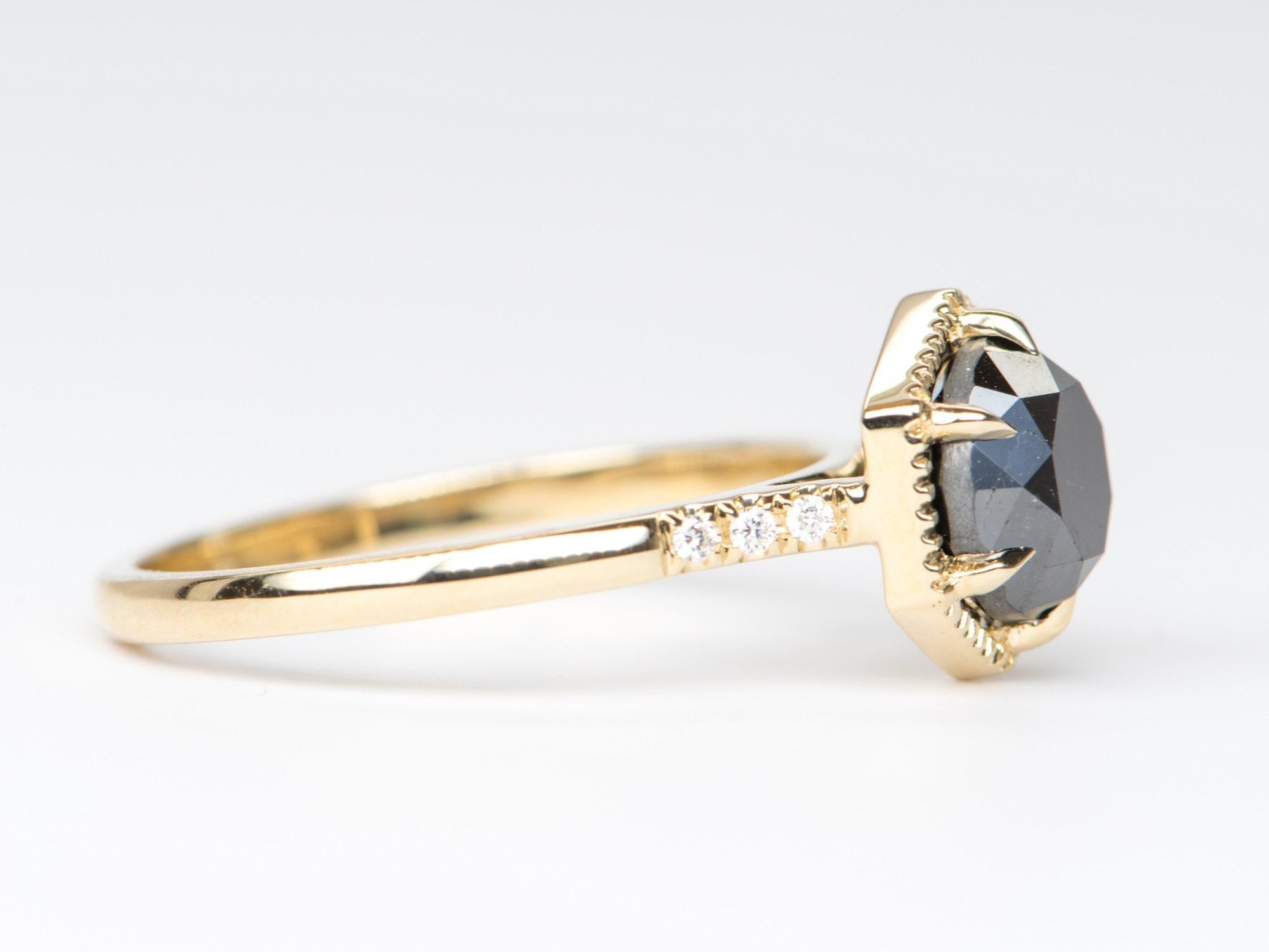 â™¥ Solid 14K yellow gold ring set with a hexagon shaped round brilliant cut black diamond in the center
â™¥ A milgrain edge setting surrounds the main stone and a trip of diamonds accent the band on each side


â™¥ US Size 7 (Free resizing up or