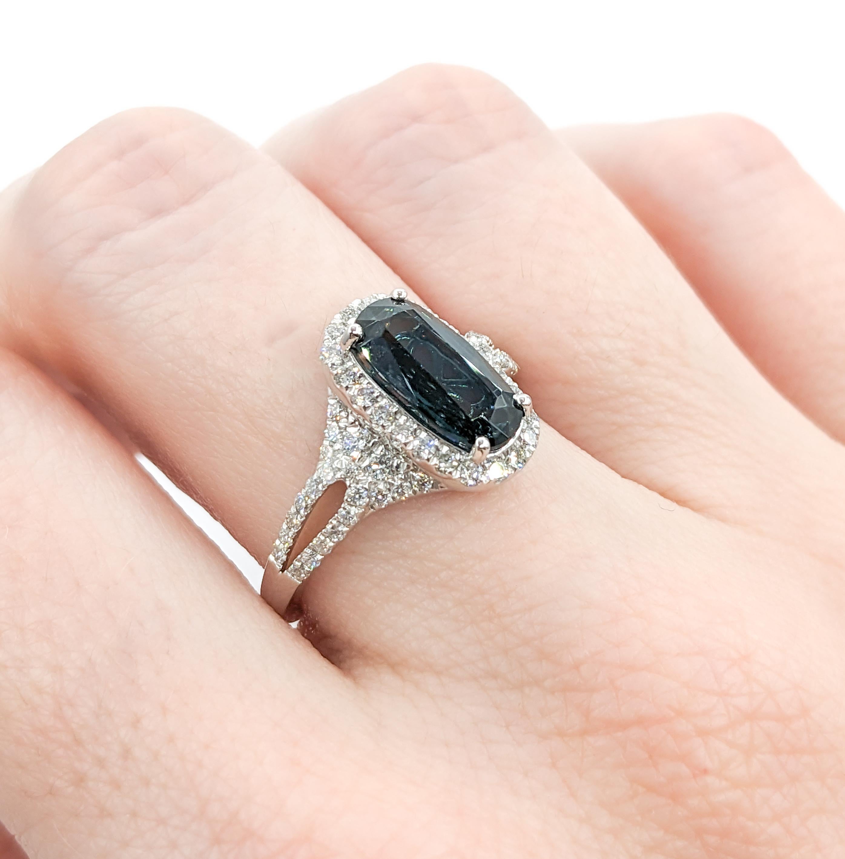 Discover the allure of this exquisite ring, meticulously crafted in refined platinum. It features a splendid array of .54 carats of round diamonds, each boasting SI clarity and a near-colorless, white sparkle. Adding to its elegance is a 2.19-carat