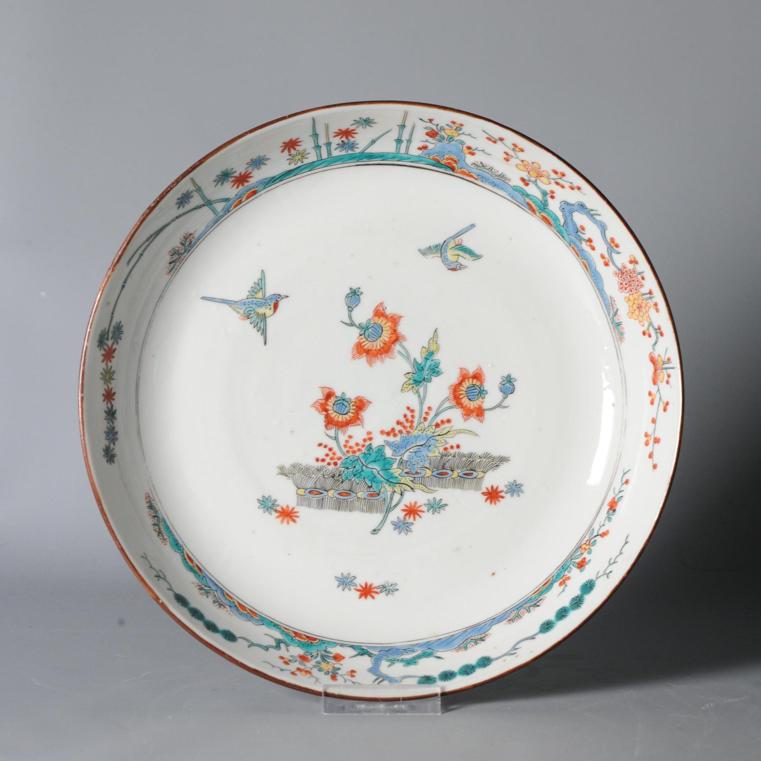 A Japanese Kakiemon-style bird, Birds (magpie) and Three friends of winter dish. Painted by by a Dutch painter to decorate a Chinese porcelain blank.

The scene and quality of painting is amazing.

Three Friends of Winter
These are pine, Prunus