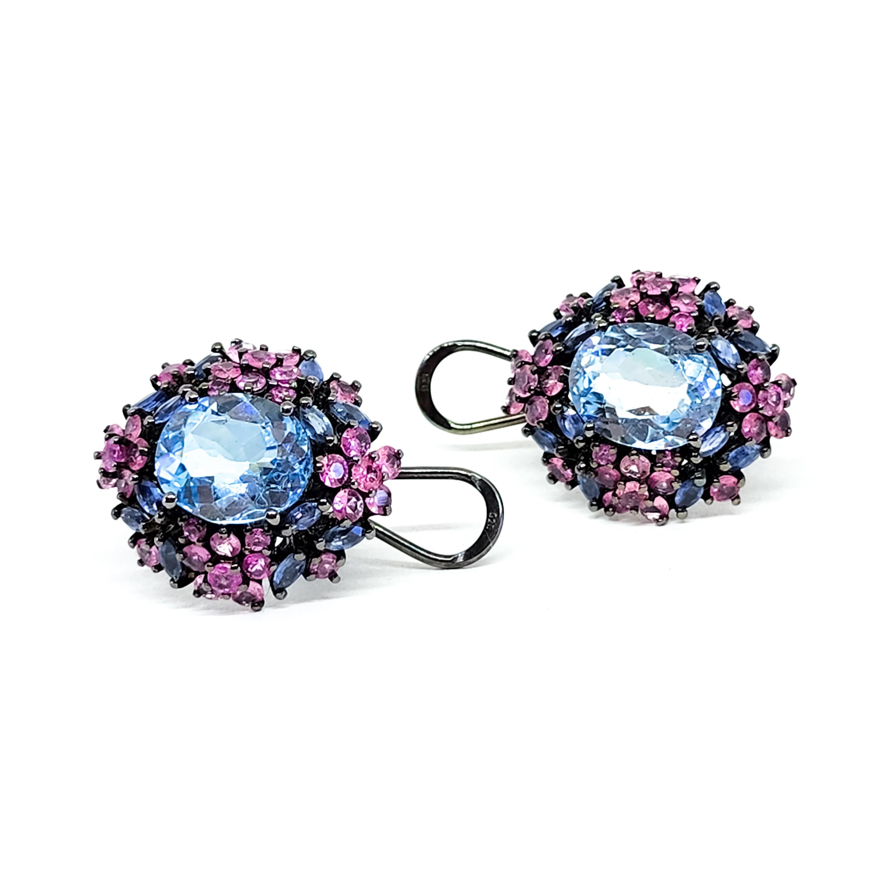 One pair of post and omega back cluster Earrings featuring a Deliciously Sweet Confectionery of Colored Gemstones in Pinks, Blues and Purples. These festive Earrings are an ode to beautiful Spring Flowers and are an appropriate accent for all