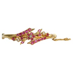 21k Yellow Gold Ruby Floral Bangle, 6.75 inches - 22.5g