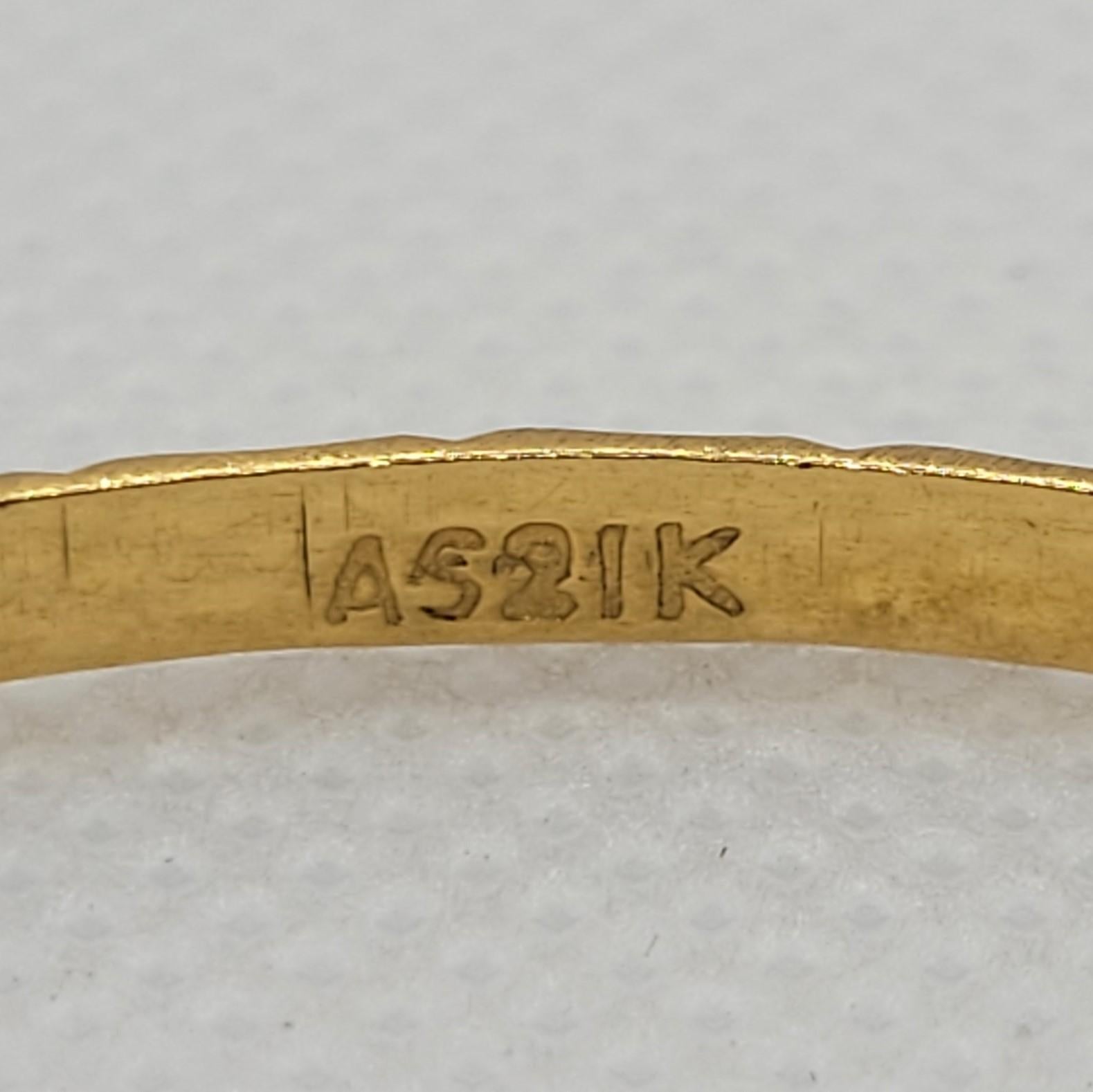 21k stamp on gold