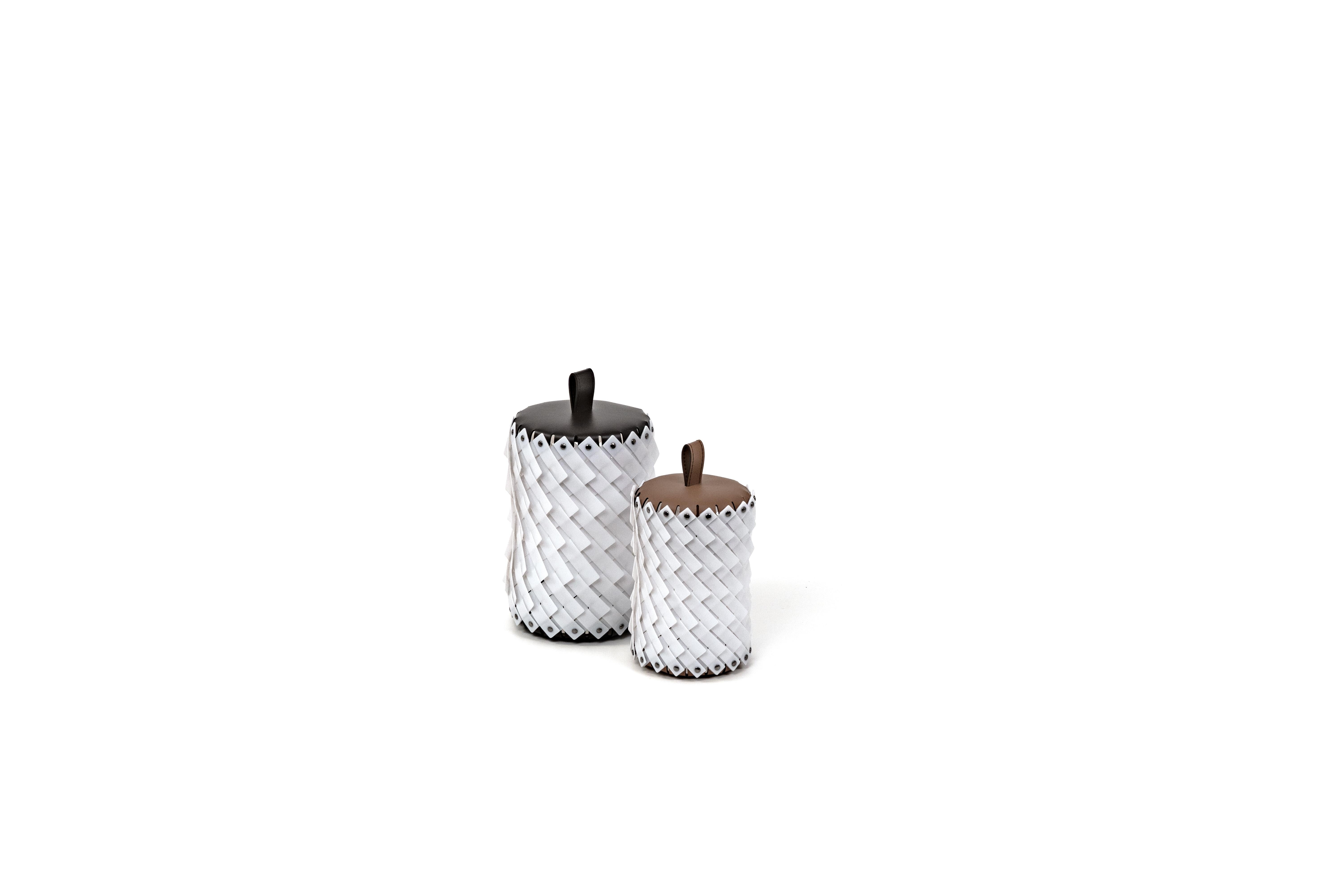 Inspired by our iconic Almeria baskets collection, Pinetti introduces a brand new family of lanterns.

Wireless and USB rechargeable these lamps are made with hand-woven plastic modulus, with the base and top are made with our recycled leather.