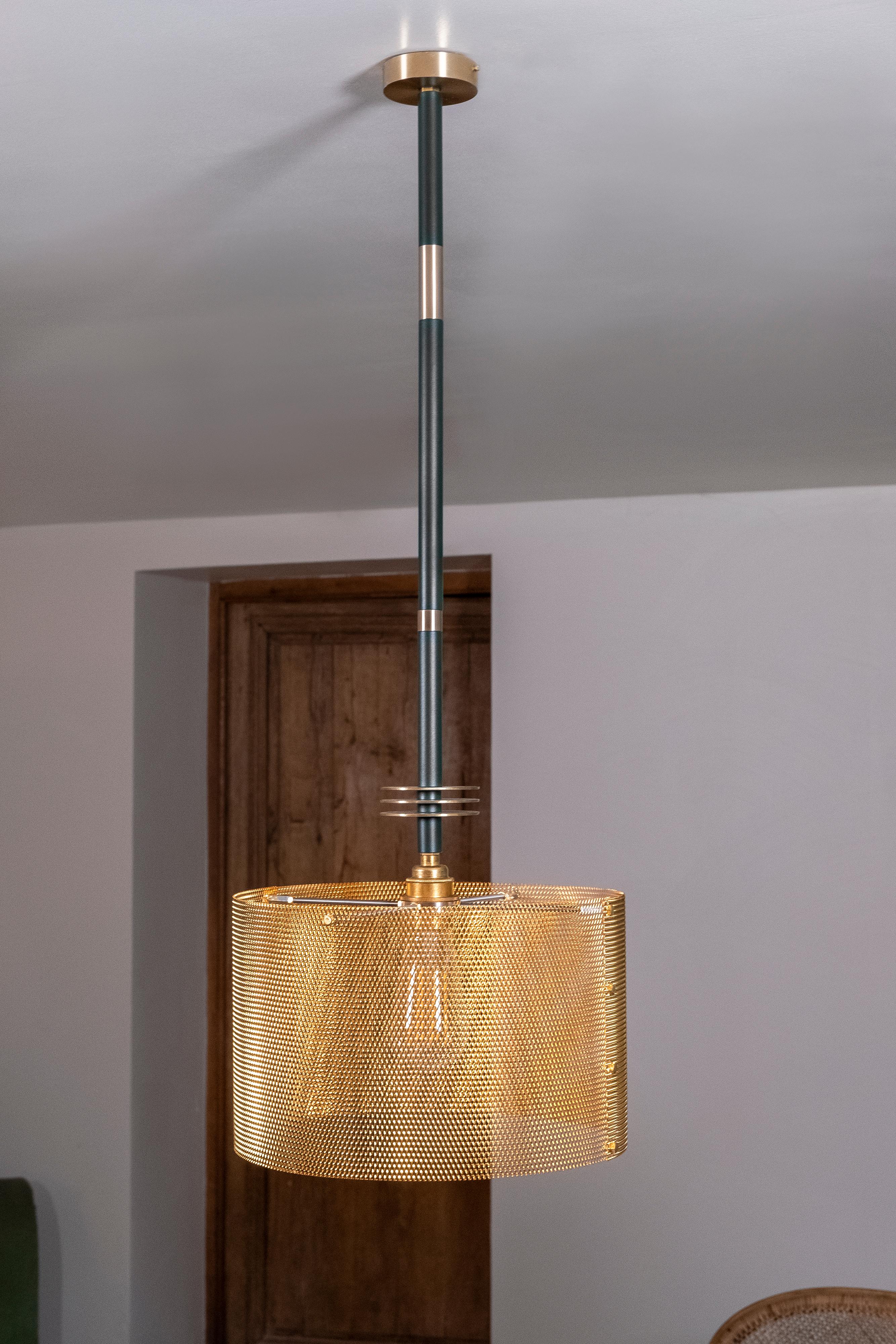 This Dédale chandelier fit with elegance in a contemporary interior, refined in its lines. 
The golden expanded metal shade diffuses an intimate light. They will be perfect for a dinner table or a bar.
Comforting lights, with character.

Chandelier