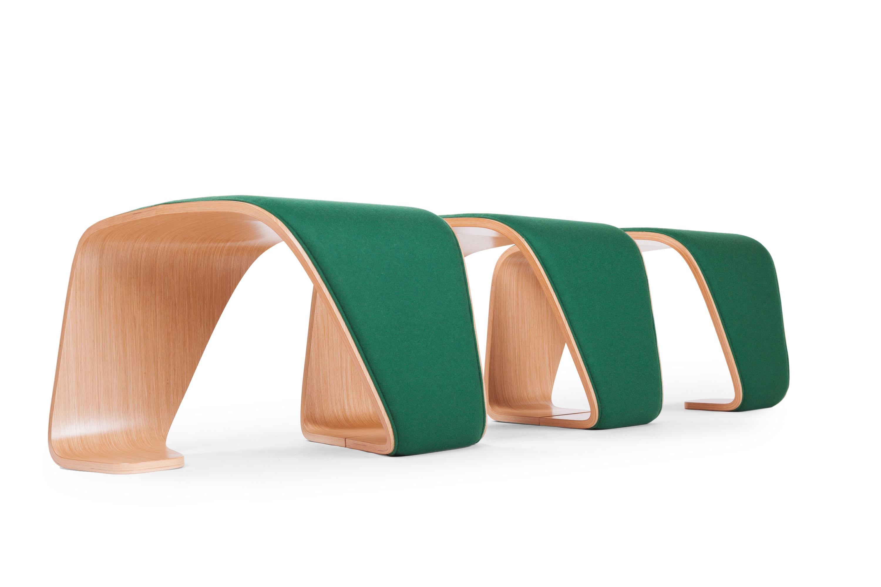 Inspired by the dynamic forms of biogenetics, the DNA modular bench consists of a single element of curved wood plywood, assembled specularly. 
The result is an appealing piece of furniture with a particular helix shape, each step of which